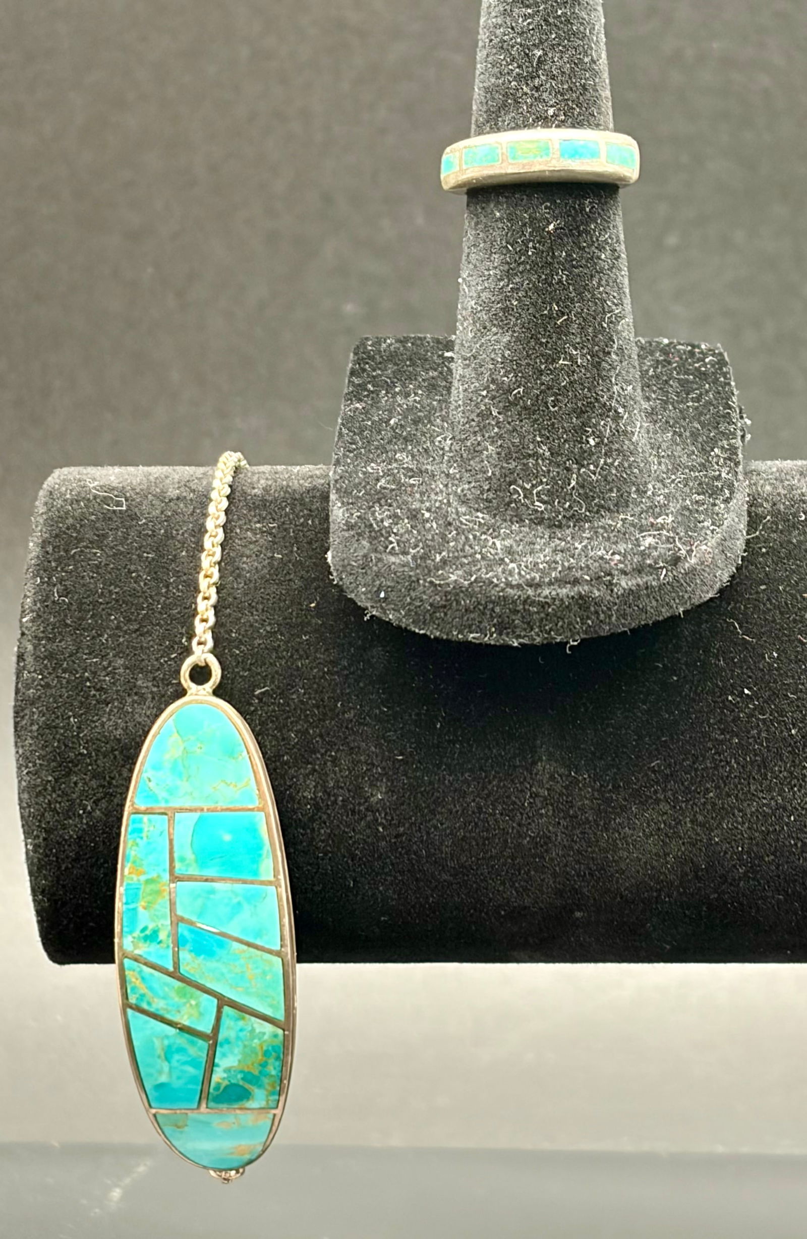 Sterling Silver Mosaic Turquoise Wrist Band Bracelet with Matching Inlay Ring: A refined Southwestern-style jewelry set featuring a sterling silver mosaic turquoise wrist band bracelet paired with a matching inlay band ring. The bracelet showcases an elongated panel of natural t