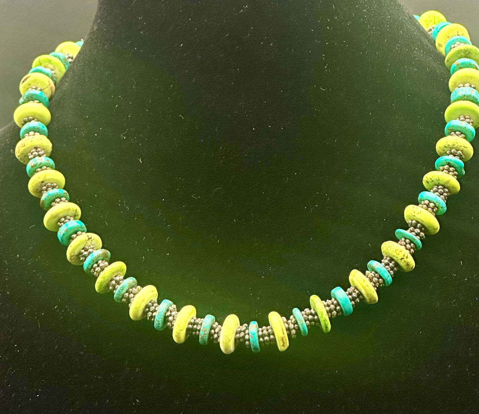 Turquoise Heishi Necklace w/ Sterling Toggle Clasp – 67g: Striking heishi-style necklace featuring alternating turquoise disc beads in blue and lime-green tones, separated by detailed sterling silver bead spacers. Finished with an ornate sterling silver togg