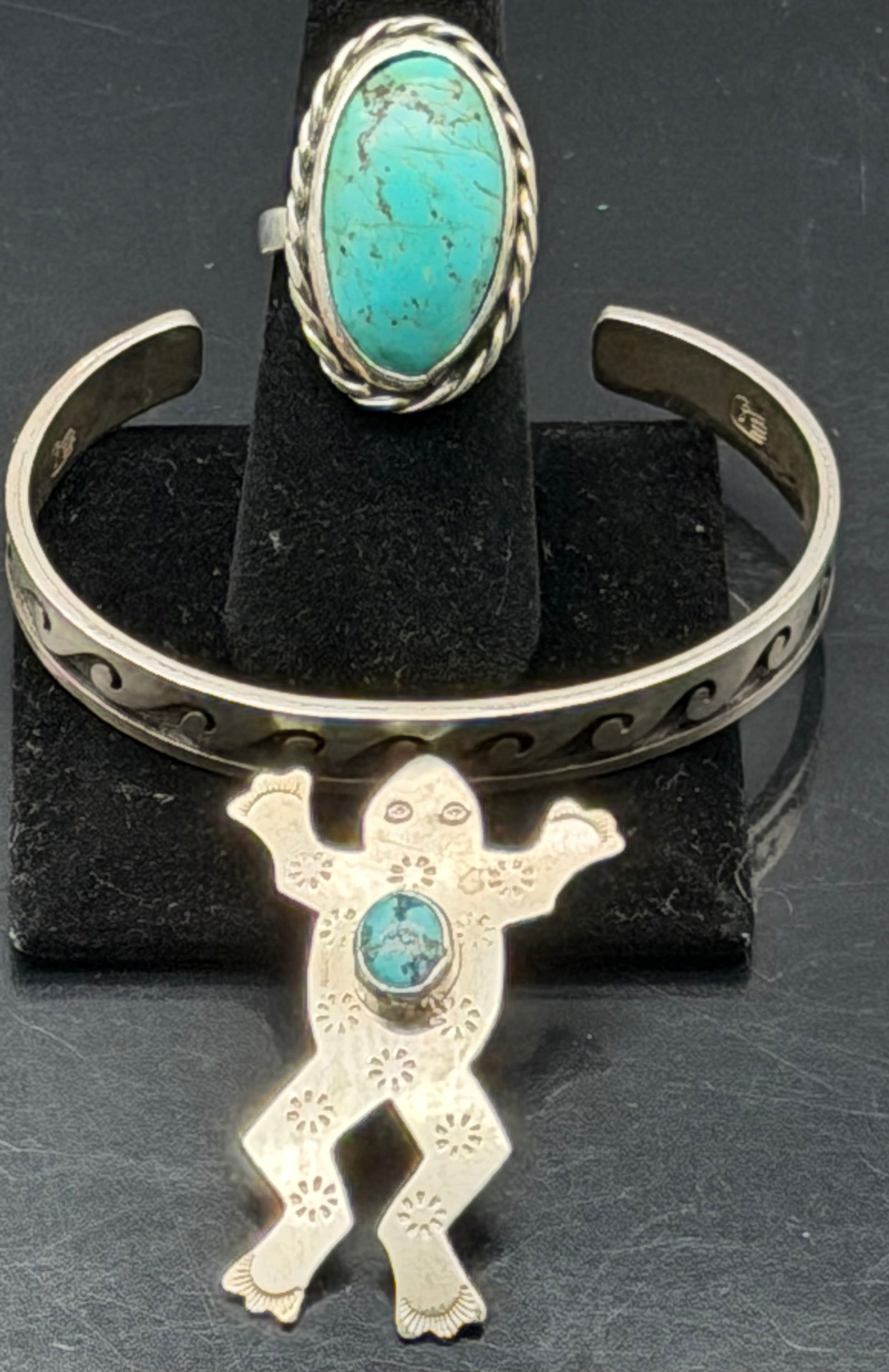 Vintage Sterling Silver Kokopelli Bracelet, Ring & Brooch Set – Mexico 925, 30g: Vintage sterling silver jewelry set including a cuff bracelet, matching ring, and Kokopelli brooch.Features a turquoise stone centerpiece with traditional Southwestern / Native American–inspired Kok