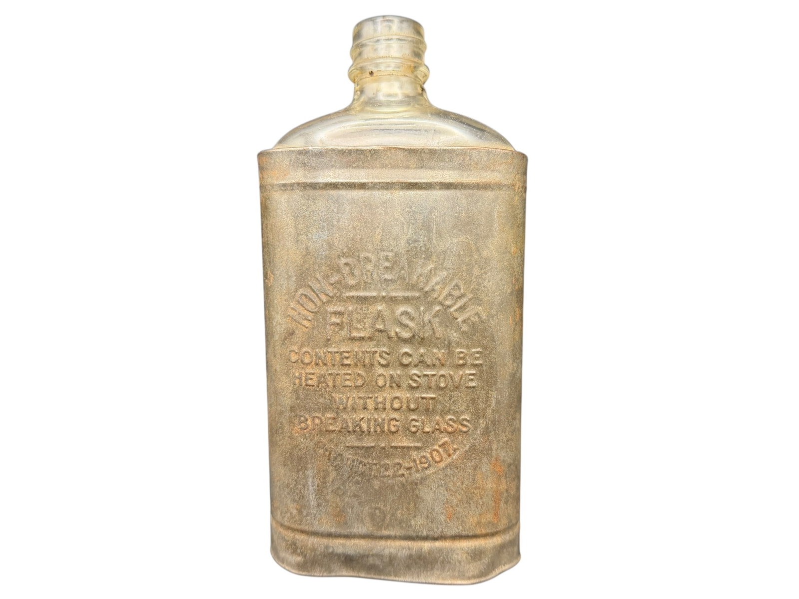 Antique Non Breakable Flask 1907 Glass Tin: Title: Non Breakable FlaskMaterial: Glass bottle with tin wrap Size: 7.5” tall. Age: Patented October 22, 1907.Condition: Overall a very nice item. Glass appears undamaged and the metal wrap is