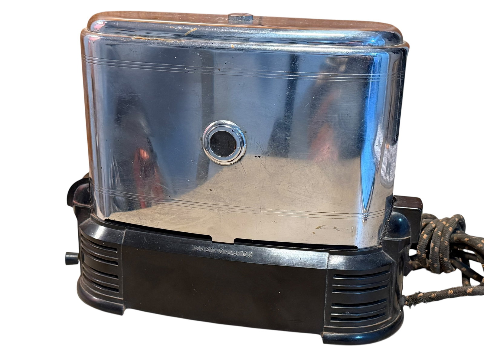 Antique Vintage Toast-O-Lator Model J Art Deco Toaster Chrome Bakelite Works!: Brtand: Toast-O-Lator Model: J - Serial 2_47Material: Chromed steel with Bakelite base, original cloth covered cordSize: 11.75” x 4.75” x 9.625” highCondition: Very nice overall. Som