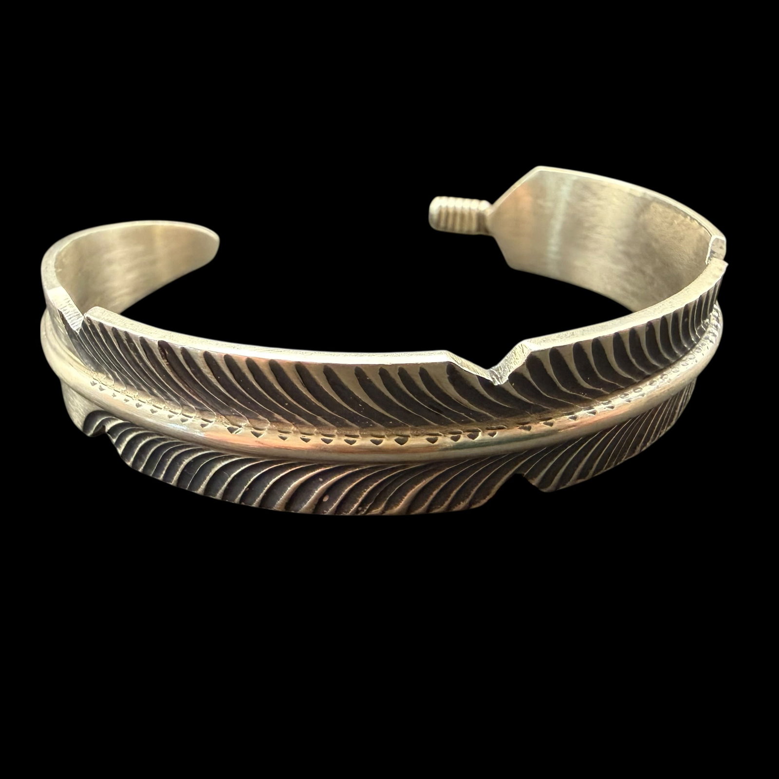 Sterling Silver Native American Chris Charley Feather Cuff Bracelet 34.87g 925: Maker: Chris Charley. / Material: Sterling Silver. / Size: 2 1/2” x 2”. / Weight: 34.87 grams. / Condition: Excellent! / Sold as is. Measurements are approximate. Please see all photos as
