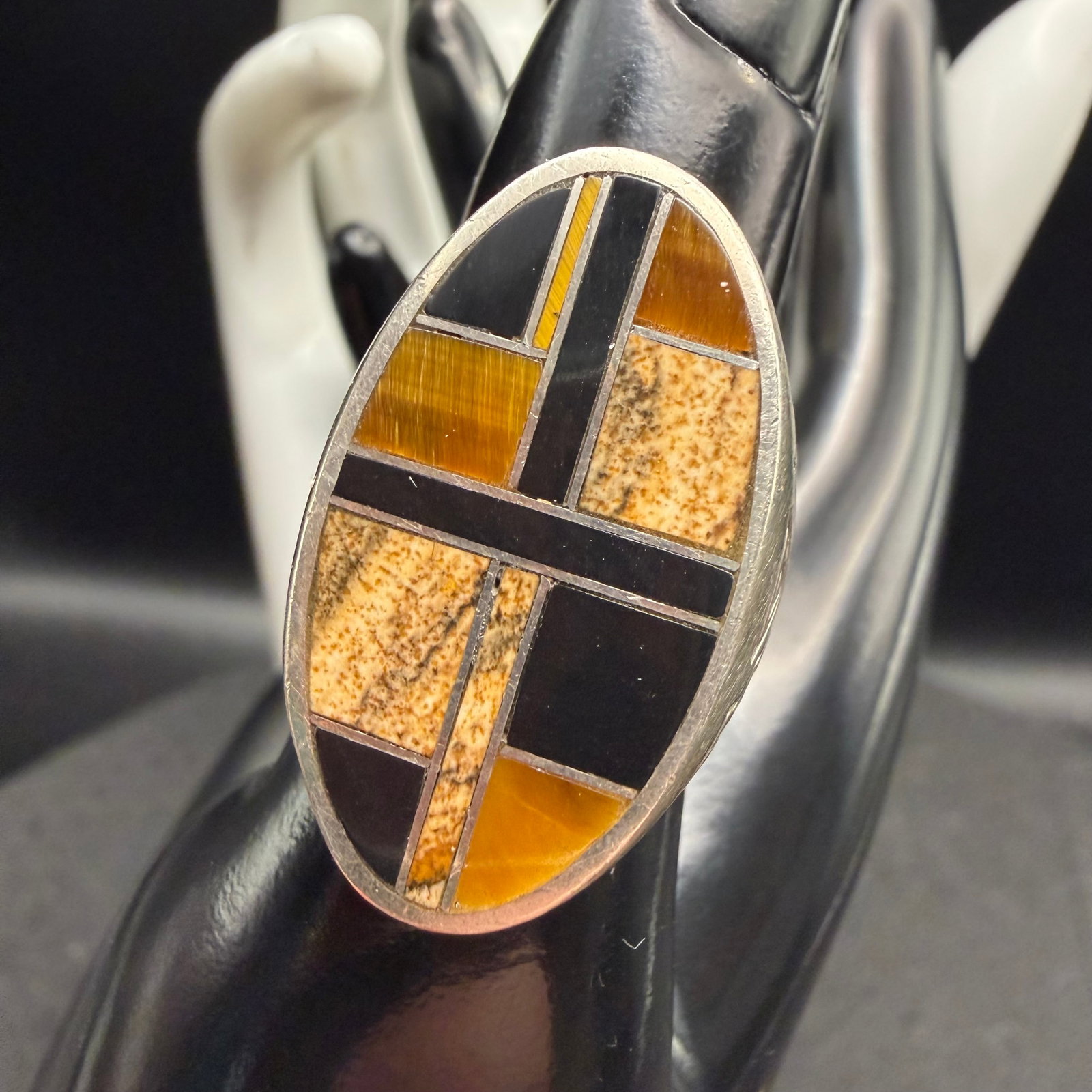 Vintage Sterling Silver Super Smith Native American Ring Onyx Tigers Eye Jasper Sz 7 17.45g 925: Maker: Super Smith SS. / Material: Sterling Silver. / Stone: Inlays of Black Onyx, Tigers Eye, Jasper. / Size: 7. Face measures 1 1/8” x 5/8”. / Weight: 17.45 grams. / Condition: Excellent