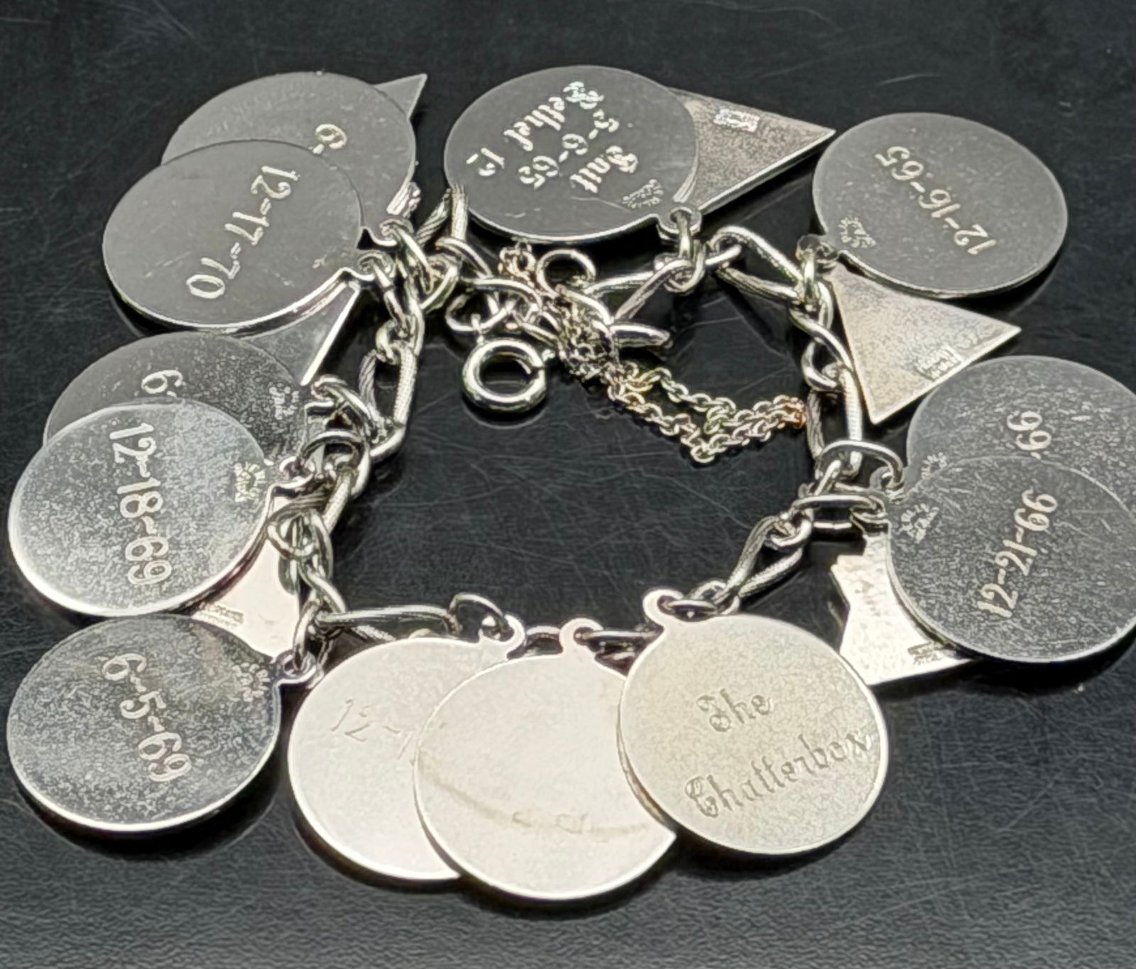 Lot of two sterling silver (925) charm bracelets. One is a heavy link bracelet with engraved heart t (1 of 7)