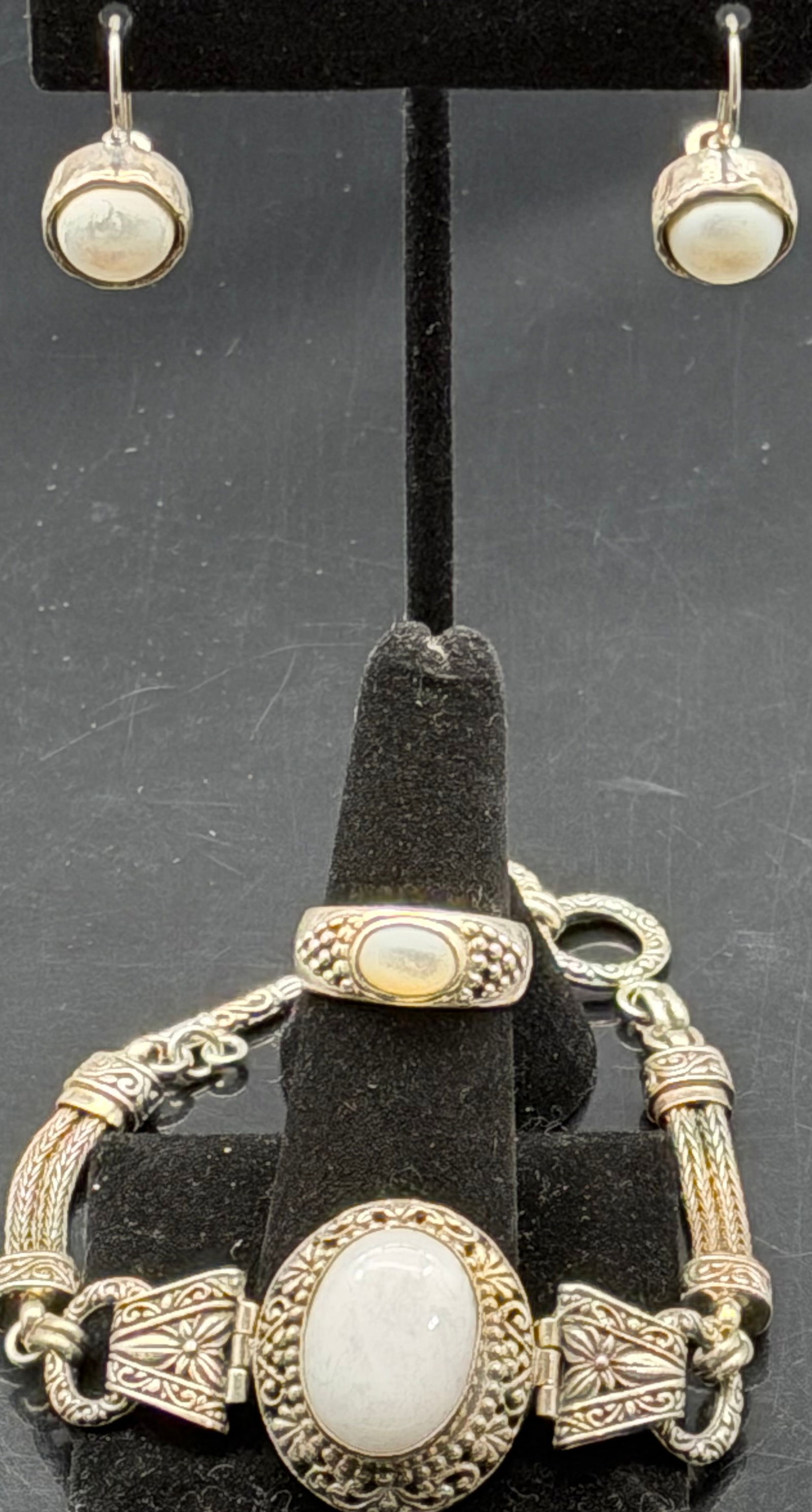 925 Sterling Silver Israel Bracelet Ring Earrings Set 51g: Heavy vintage sterling silver jewelry set stamped 925 and Israel, including woven link bracelet with decorative centerpiece, matching ring, and drop earrings. Features detailed handcrafted style typic