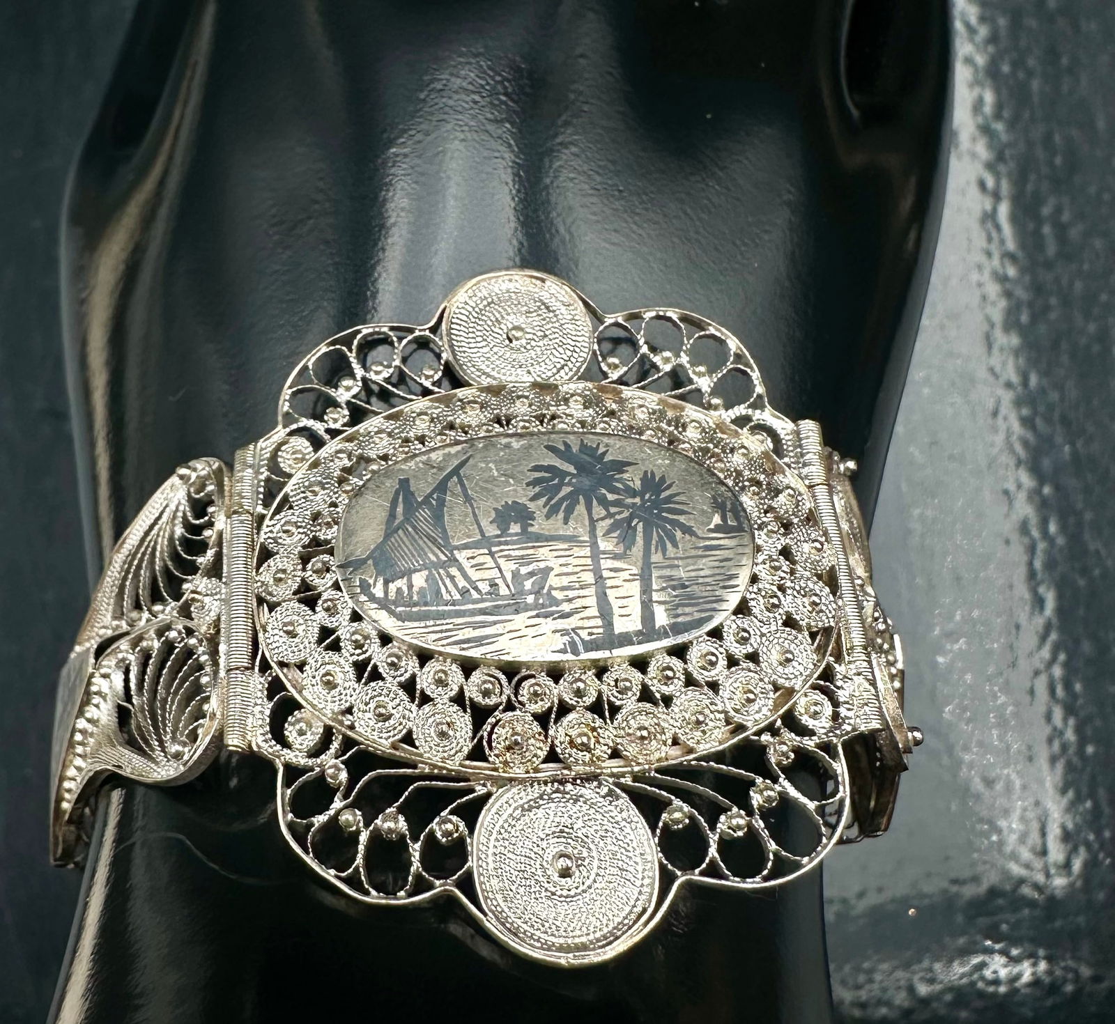 Vintage Scenic Filigree Hinged Bracelet Silver Tone 20g: Vintage hinged bracelet featuring detailed scenic landscape panels framed by ornate filigree openwork. Attractive architectural design typical of early to mid-20th century jewelry. Silver tone finish.