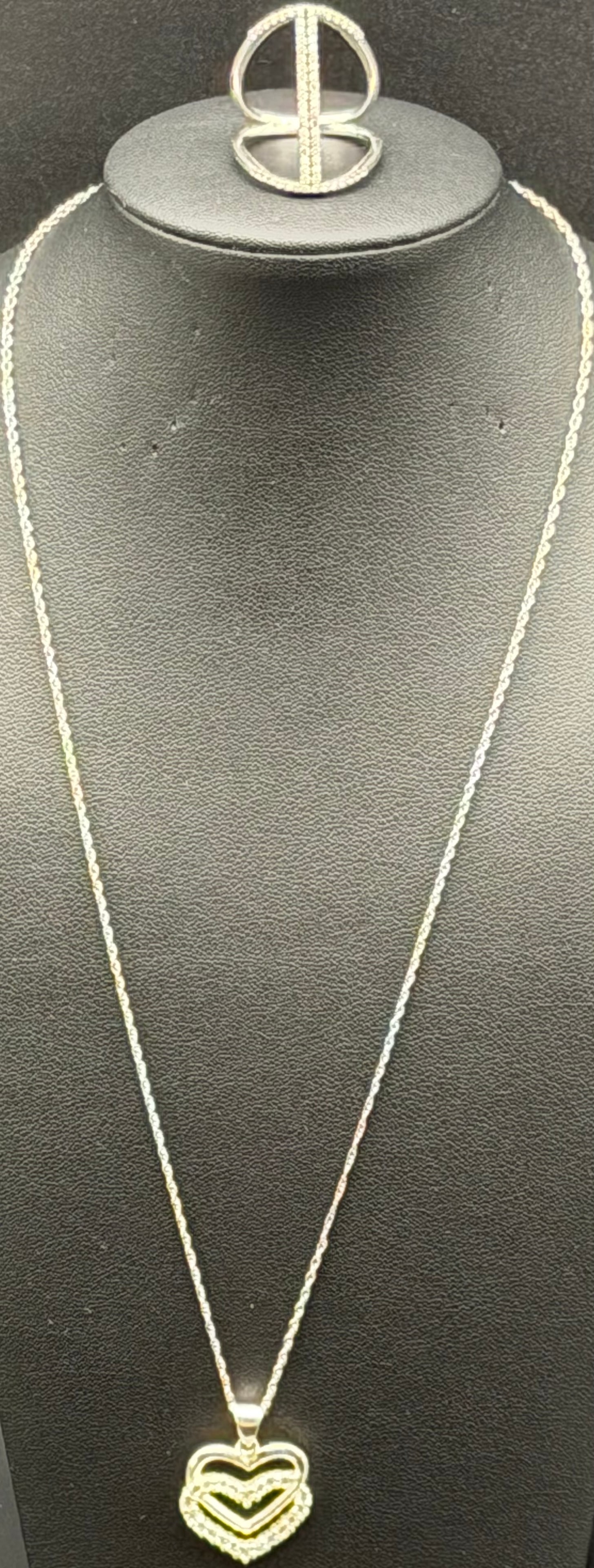 925 Sterling Silver Heart Pendant Necklace & Ring Set 8g: Matching jewelry set in sterling silver, marked 925 DJ, including heart pendant necklace and coordinating modern style ring with pavé CZ accents.