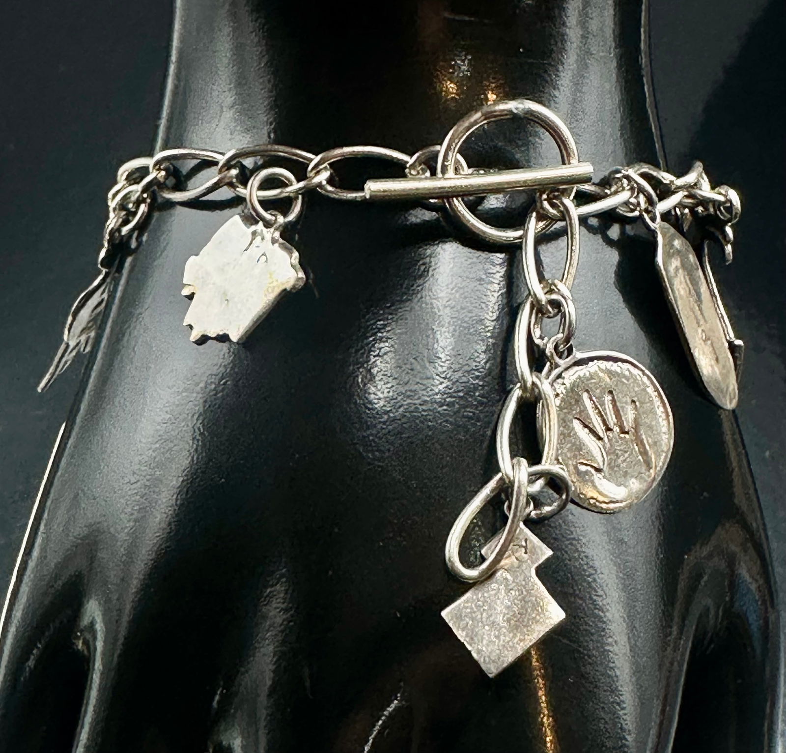 Vintage Peru 925 Sterling Silver Llama & Andean Charm Bracelet 29g: Vintage artisan bracelet from Peru crafted in sterling silver and marked “PERU 925.” Features traditional Andean themed charms including llama and cultural motif figures. Beautiful handcrafted