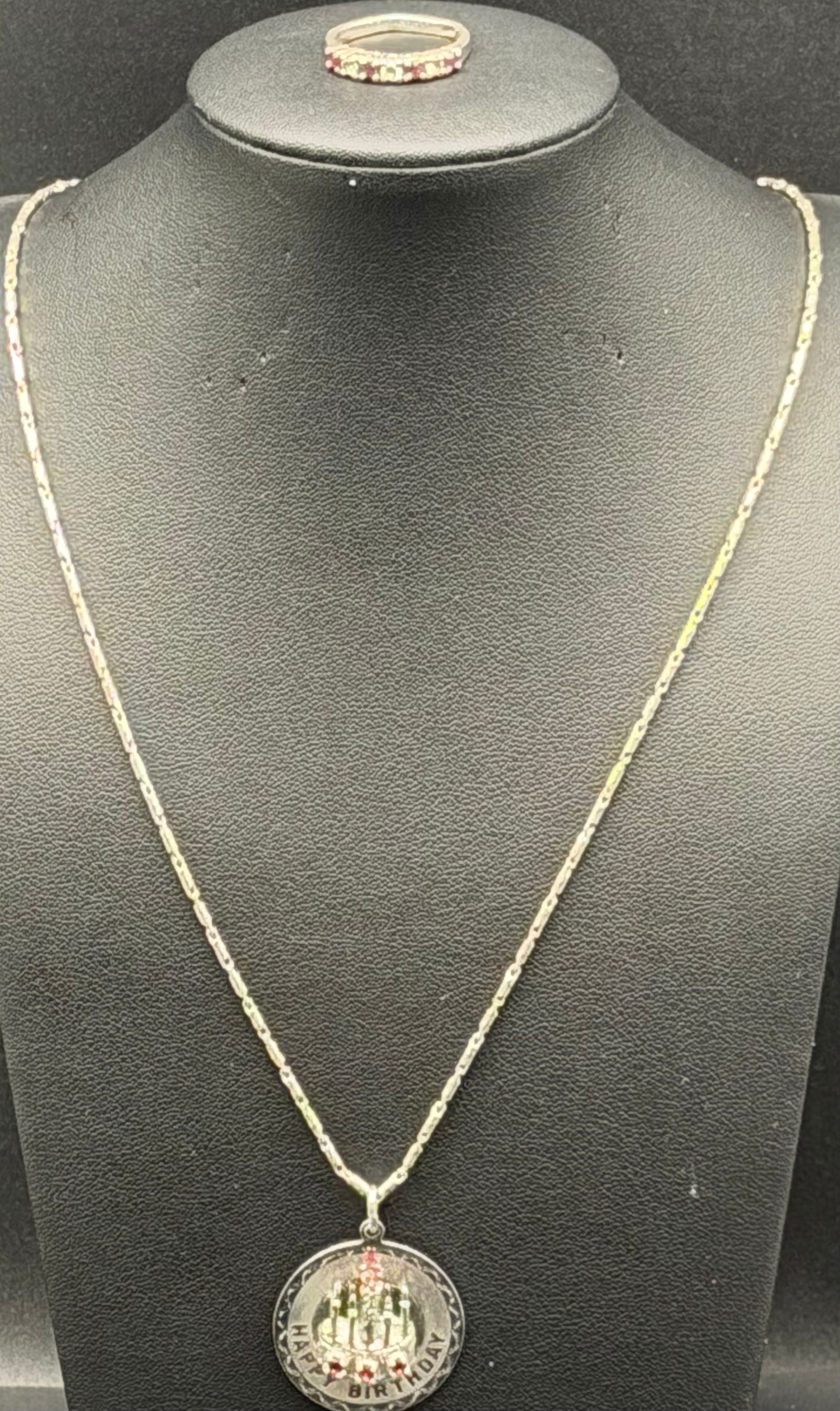 terling Birthday Pendant Necklace + Ring Red Stones 15g: Nice mixed jewelry set including a sterling silver birthday pendant necklace and a red-stone band ring. Pendant features a “Happy Birthday” cake design with red accent stones and is marked Ste