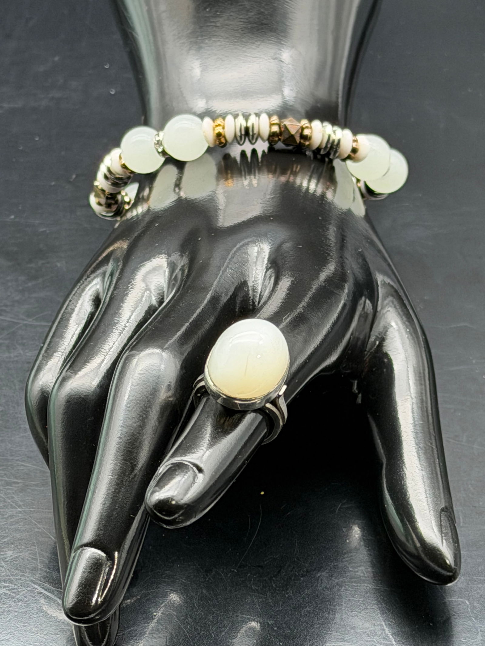 Elegant Silver Oval Stone Ring & Bead Bracelet Set 22g: Attractive jewelry set including a large oval cabochon stone ring with silver mount and a coordinating bead stretch bracelet with mixed bead and spacer design. Bold statement look with soft translucen