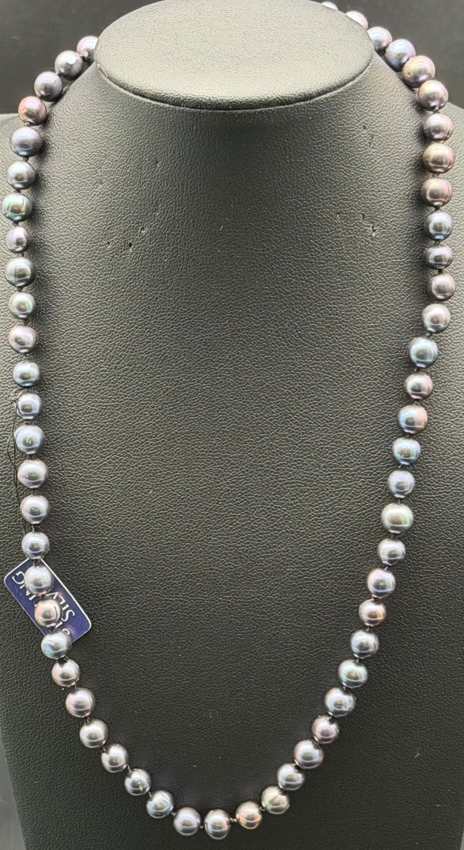Genuine Freshwater Pearl Necklace Peacock Gray Strand 23g: Genuine freshwater pearl necklace with dark peacock gray iridescent pearls. Pearls are near-round to slightly baroque with natural color variation and good luster. Tag reads Genuine Fresh Water Pearl