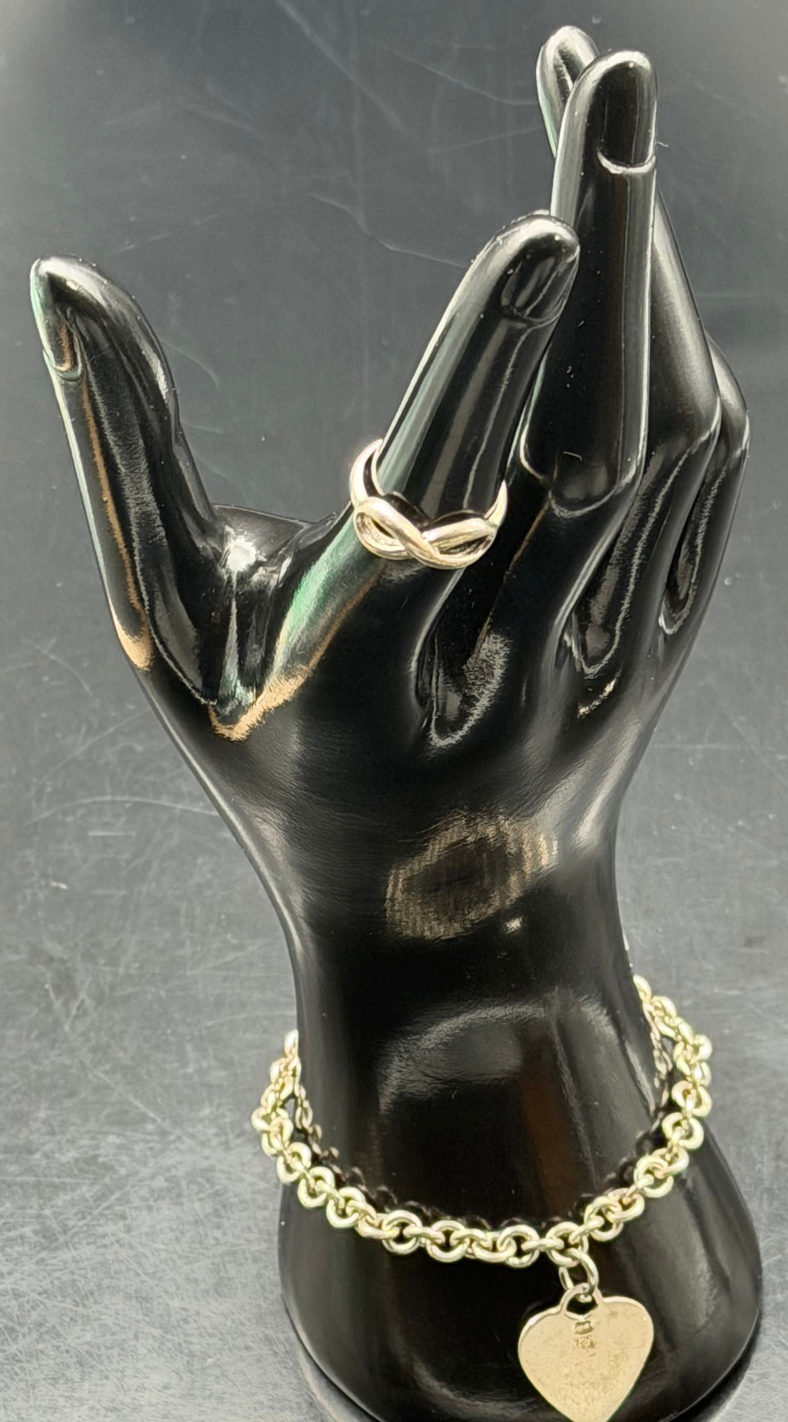 Sterling Silver 925 Heart Charm Bracelet & Knot Ring Set 22g Marked MO: Beautiful matching sterling silver jewelry set including a chain link bracelet with heart charm and a coordinating knot-style ring. Both pieces are marked 925 with MO maker’s mark. Classic, wearable