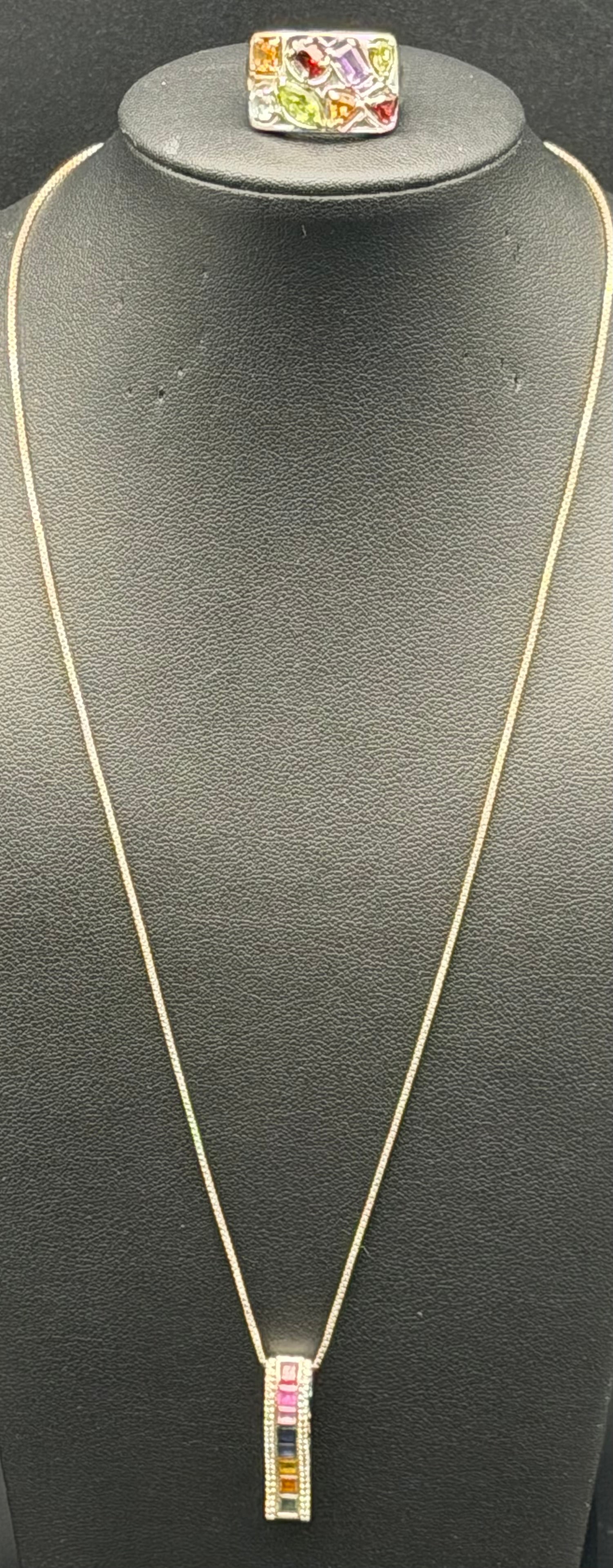 SUN 925 Sterling Silver Multicolor CZ Bar Pendant Necklace & Ring Set 12g: Matching sterling silver jewelry set featuring a vertical bar pendant necklace set with multicolor CZ stones and coordinating multi-stone ring. Both pieces are marked 925 SUN. Bright rainbow gemstone