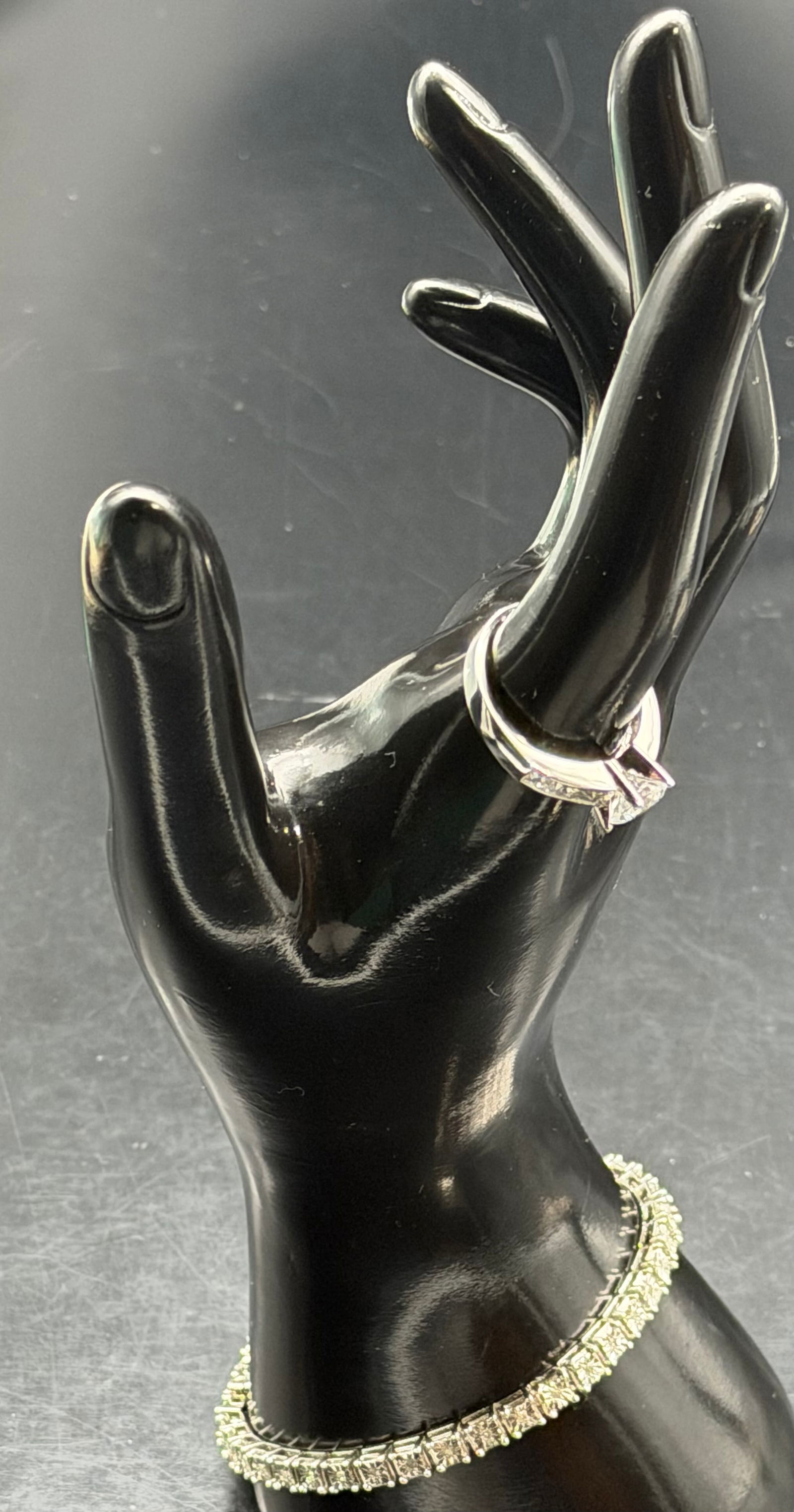 925 Sterling Silver Ring & Bracelet Set Clear Stones 17g: Matching ring and tennis bracelet set crafted in stamped 925 sterling silver. Features clear faceted stones in a classic line bracelet design with coordinating solitaire-style ring. Elegant everyday o