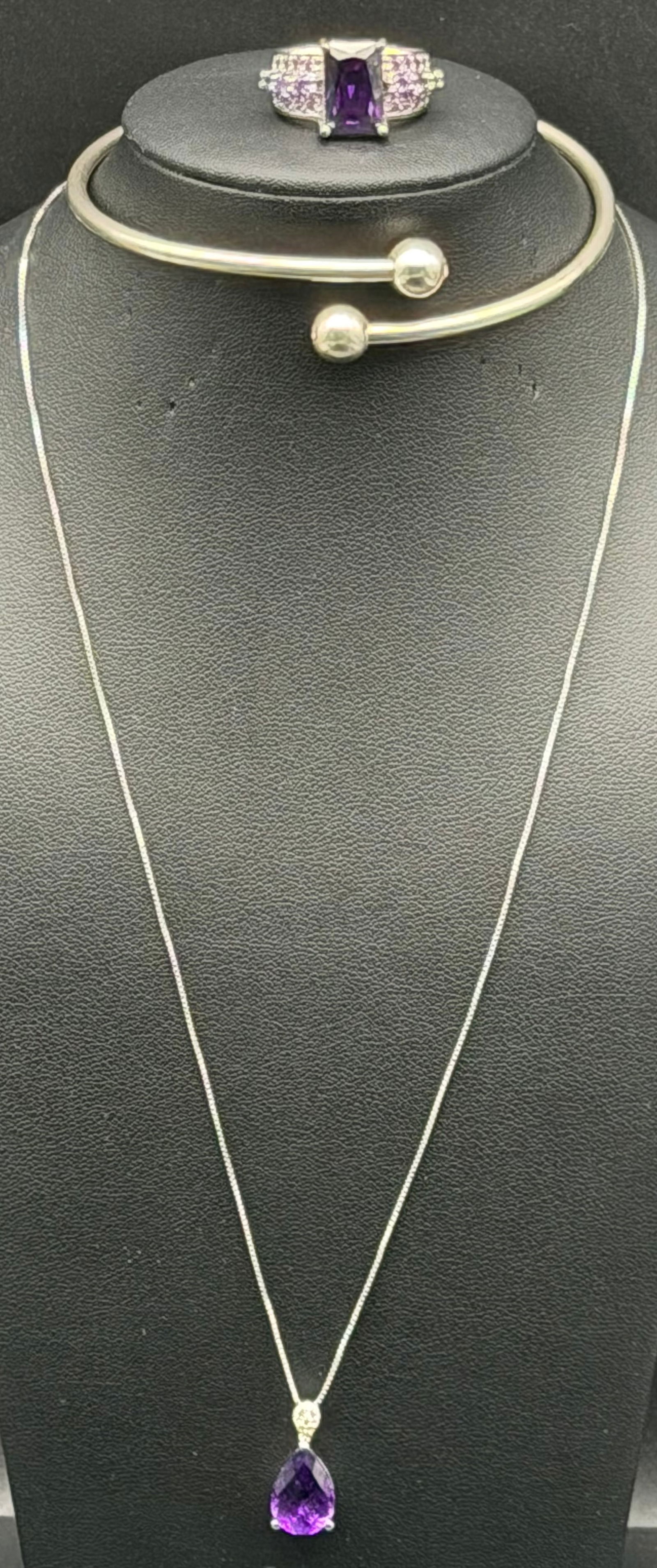 Vintage Sterling Silver 925 Amethyst Color Necklace Ring Bracelet Set 22g: Elegant sterling silver jewelry set featuring a teardrop purple stone pendant necklace, matching statement ring, and open cuff bracelet. All pieces are sterling silver with a classic bright finish. Th