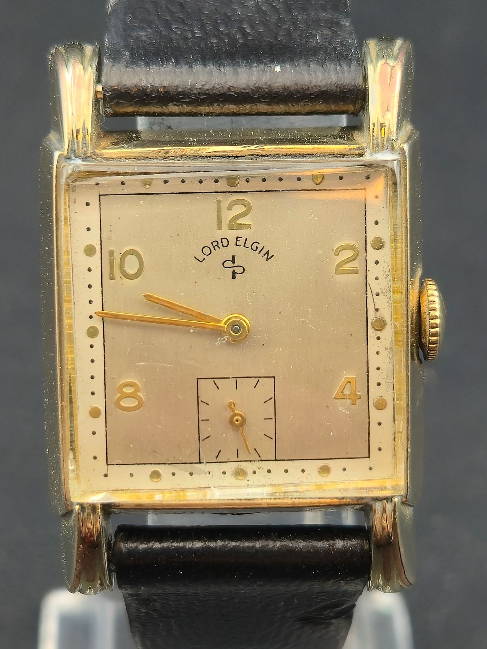 1930s Lord Elgin Rectangular Wristwatch Elgin Cal 556 21J 14K Gold Filled Small Seconds: Vintage Lord Elgin rectangular wristwatch from the Art Deco era. The dial is signed “Lord Elgin” and features applied Arabic numerals with a subsidiary small seconds register at 6 o’clock. T