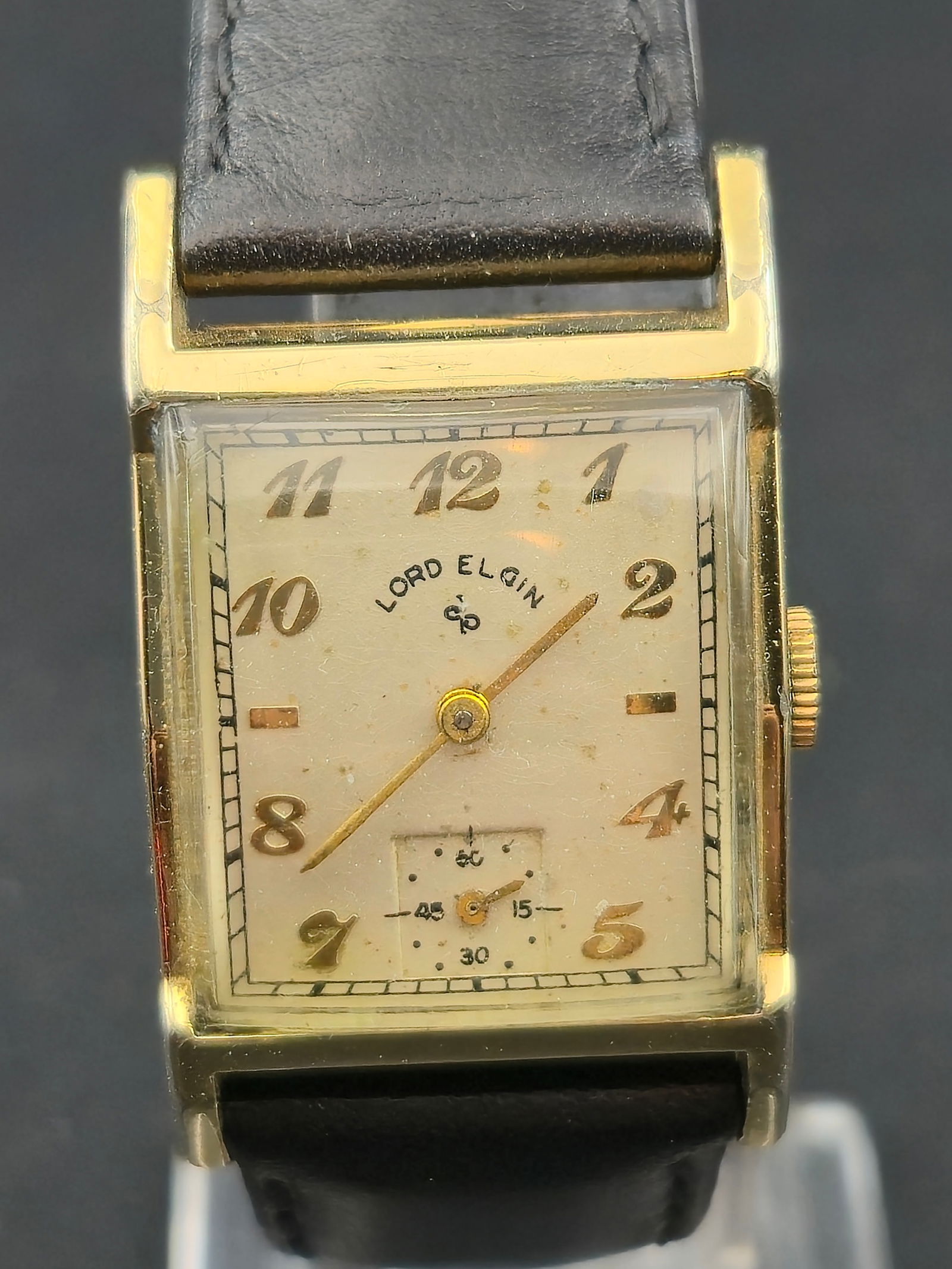 1930s Lord Elgin Rectangular Wristwatch Elgin Cal 626 21J 14K Gold Filled Small Seconds: Vintage Lord Elgin rectangular wristwatch featuring a classic Art Deco design. The dial is signed “Lord Elgin” with applied Arabic numerals and a subsidiary small seconds register at 6 o’clo