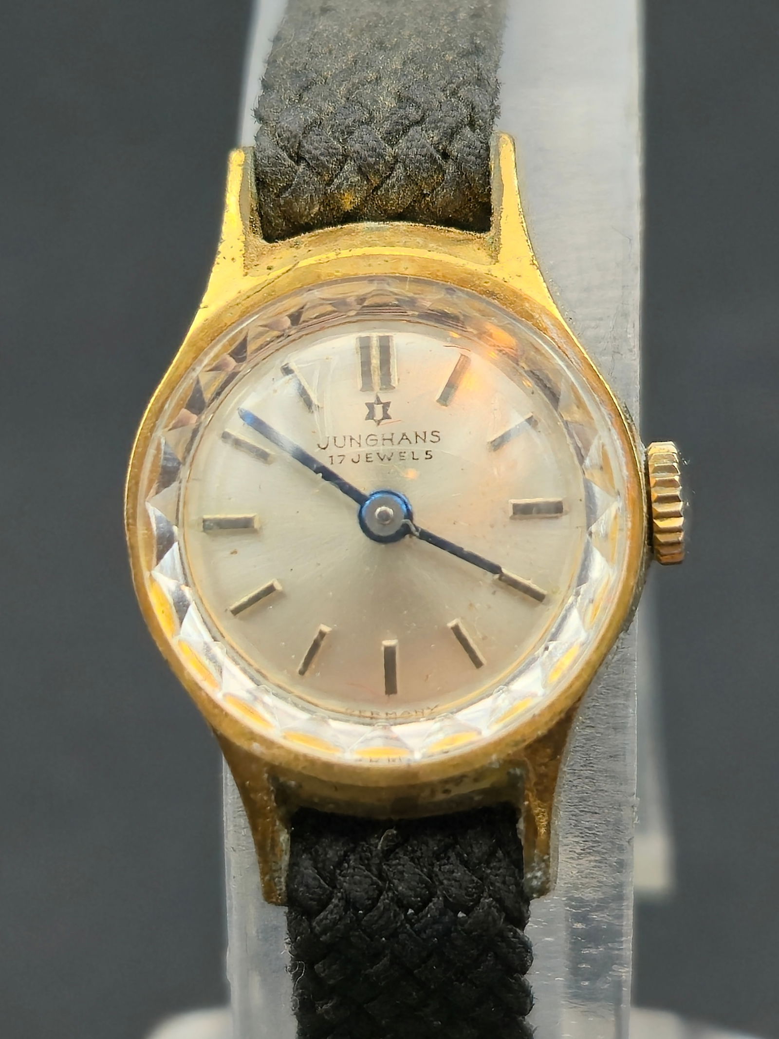 1960s Junghans 17J Ladies 17mm Gold Tone Manual Wind Watch Running: 1960s Junghans ladies wristwatch powered by a 17 jewel manual wind movement marked Junghans 674 Germany. Silver sunburst dial signed Junghans 17 Jewels with applied baton markers and blued hands. Face