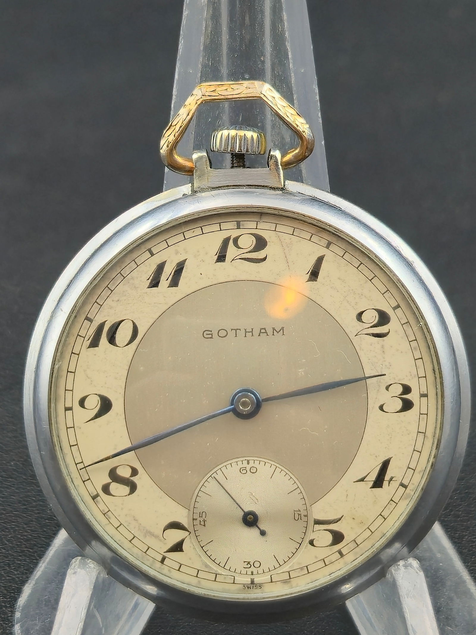 1940s Gotham 7J 45mm Swiss Pocket Watch RPKO 43991 Running: Vintage 1940s Gotham Swiss pocket watch powered by a 7 jewel manual wind movement marked RPKO 43991, Seven 7 Jewels Unadjusted. Movement signed Gotham Watch Co Inc Swiss. Silver tone open face case wi