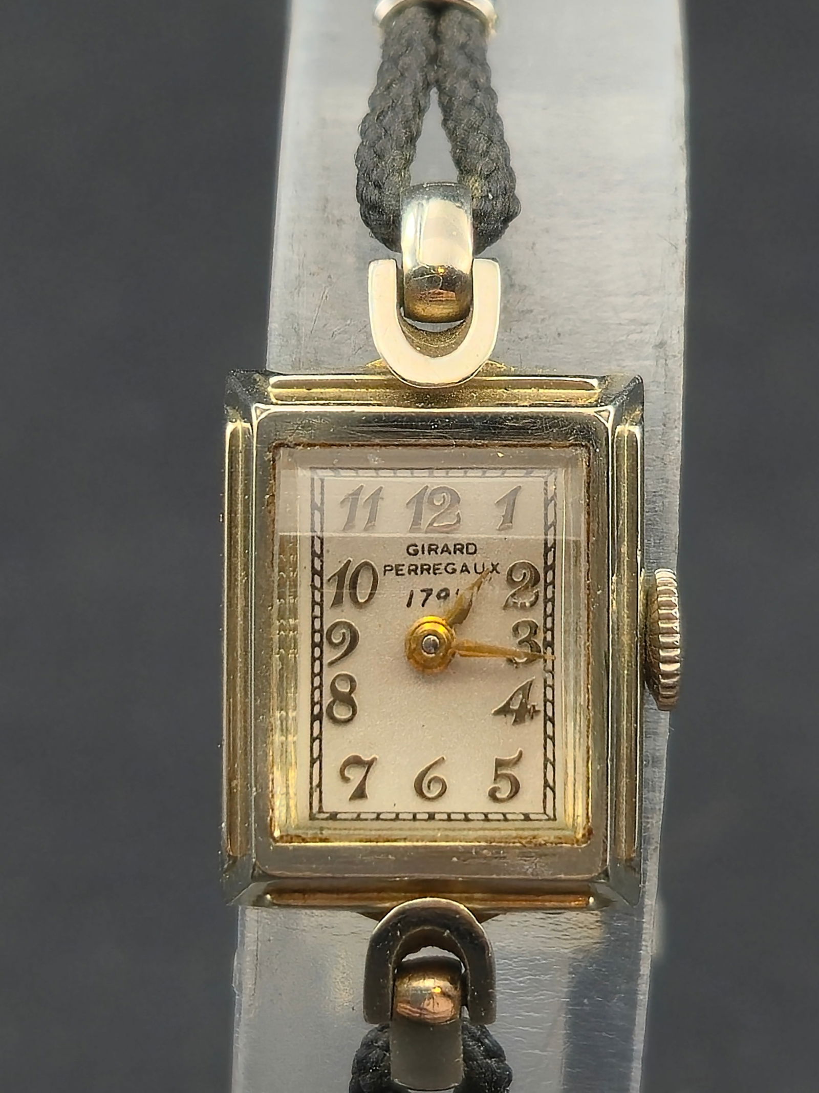1930s Girard Perregaux 1791 17J 14K Gold Filled Rectangular 14mm Manual Wind Runs: Circa 1930s Girard Perregaux rectangular wristwatch signed Girard Perregaux 1791 on dial. Manual wind Swiss movement signed Girard Perregaux & Co, Seventeen 17 Jewels, Unadjusted, movement serial 7321