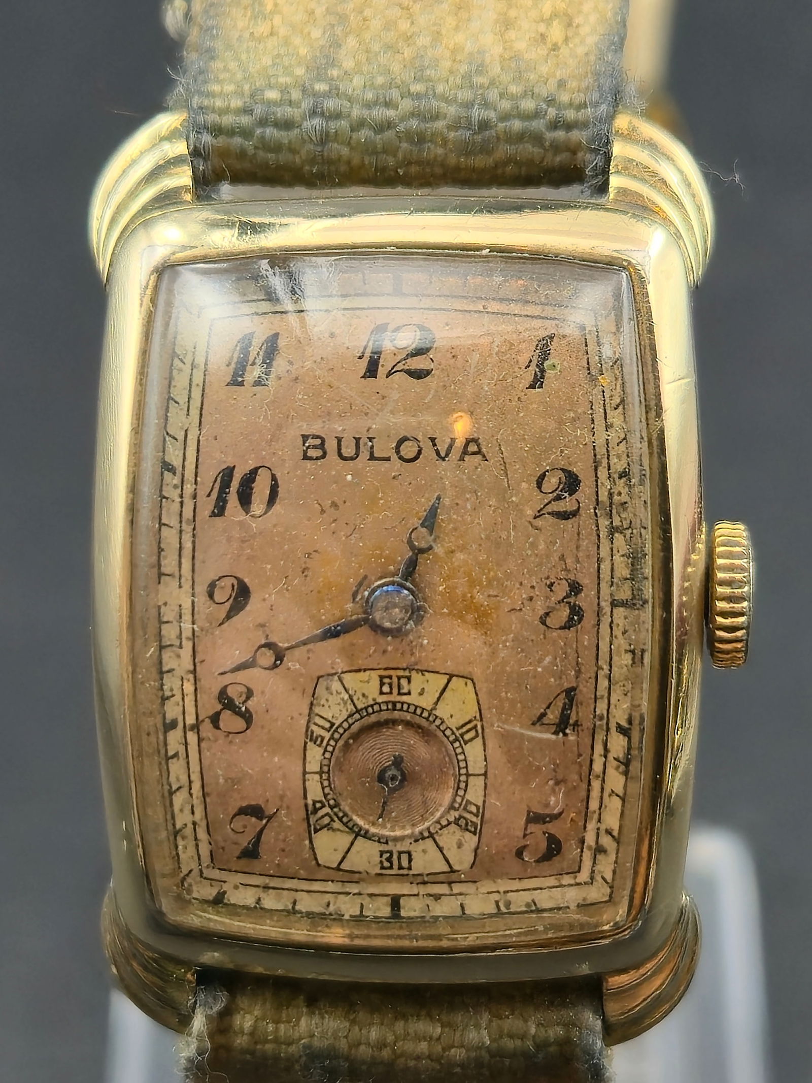1937 Bulova 7 Jewel 10K Gold Filled Rectangular 21mm Manual Wind Small Seconds Runs: Vintage 1937 Bulova rectangular manual wind wristwatch with small seconds at 6. Dial signed Bulova with Arabic numerals and subsidiary seconds register.Movement signed Bulova Watch Co U.S.A., 7 Jewels