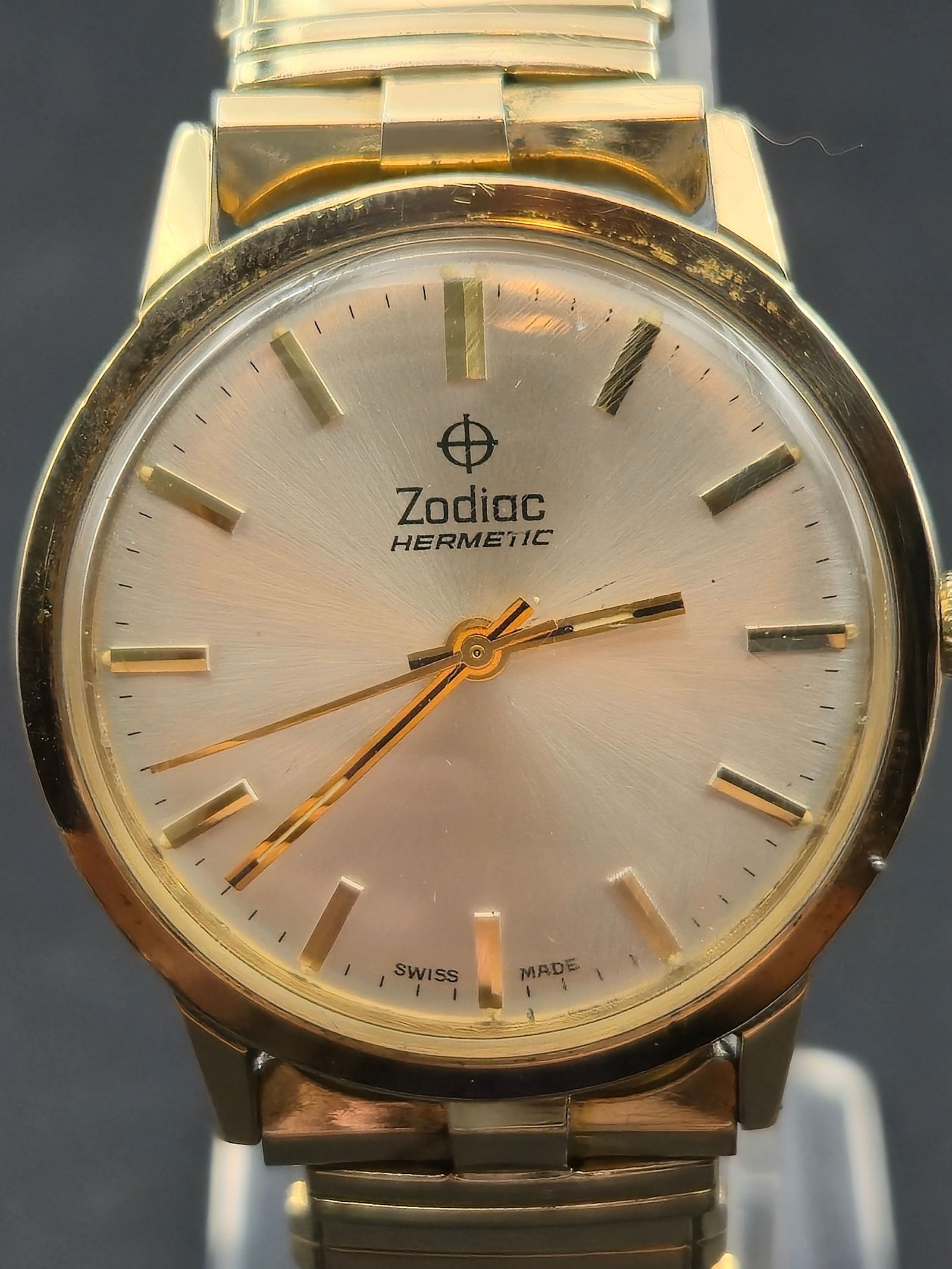 1960s Zodiac Hermetic Ref 613 853 Cal 61A 17J Gold Plated 34mm Running: Vintage 1960s Zodiac Hermetic wristwatch powered by Zodiac caliber 61A manual wind movement with 17 jewels. Movement signed Zodiac Ltd Swiss Seventeen 17 Jewels. Inside case stamped Zodiac Ltd Le Locl