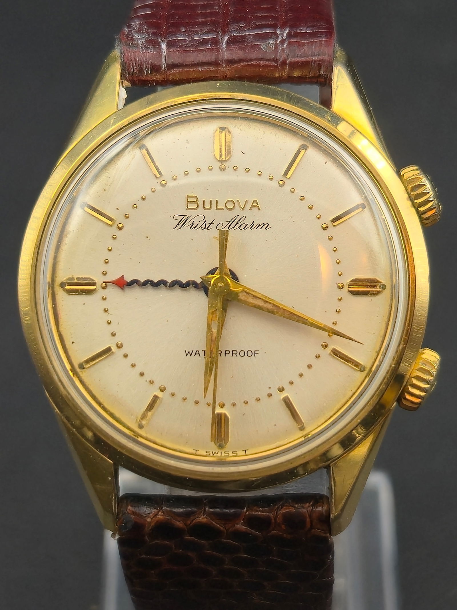 1969 Bulova Wrist Alarm M9 34mm Gold Plated 40 Microns 17J Swiss Full Operation Stainless Back: 1969 Bulova Wrist Alarm with dual crown configuration for time and alarm setting.Dial signed:BulovaWrist AlarmWaterproofT Swiss TGold tone case with stainless steel back. Interior case marked:Bezel Go