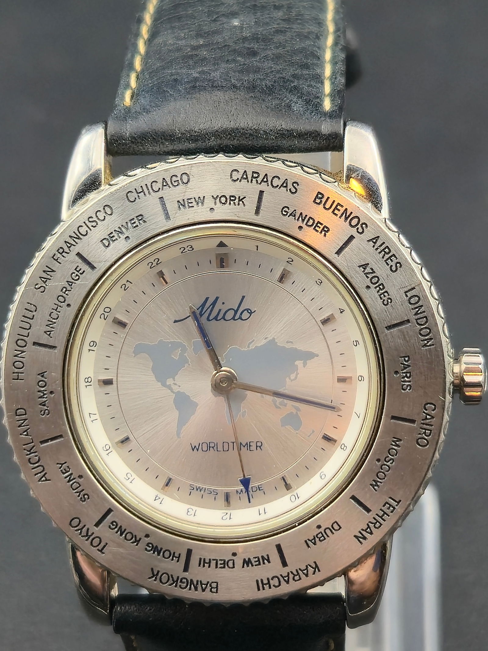 Mido Worldtimer 5200 39mm Stainless Steel Quartz World Map Dial New Battery: Mido Worldtimer quartz wristwatch featuring world map dial and 24 hour inner ring.Dial signed:MidoWorldtimerSwiss MadeRotating stainless steel city bezel with global time zones including New York, Lon