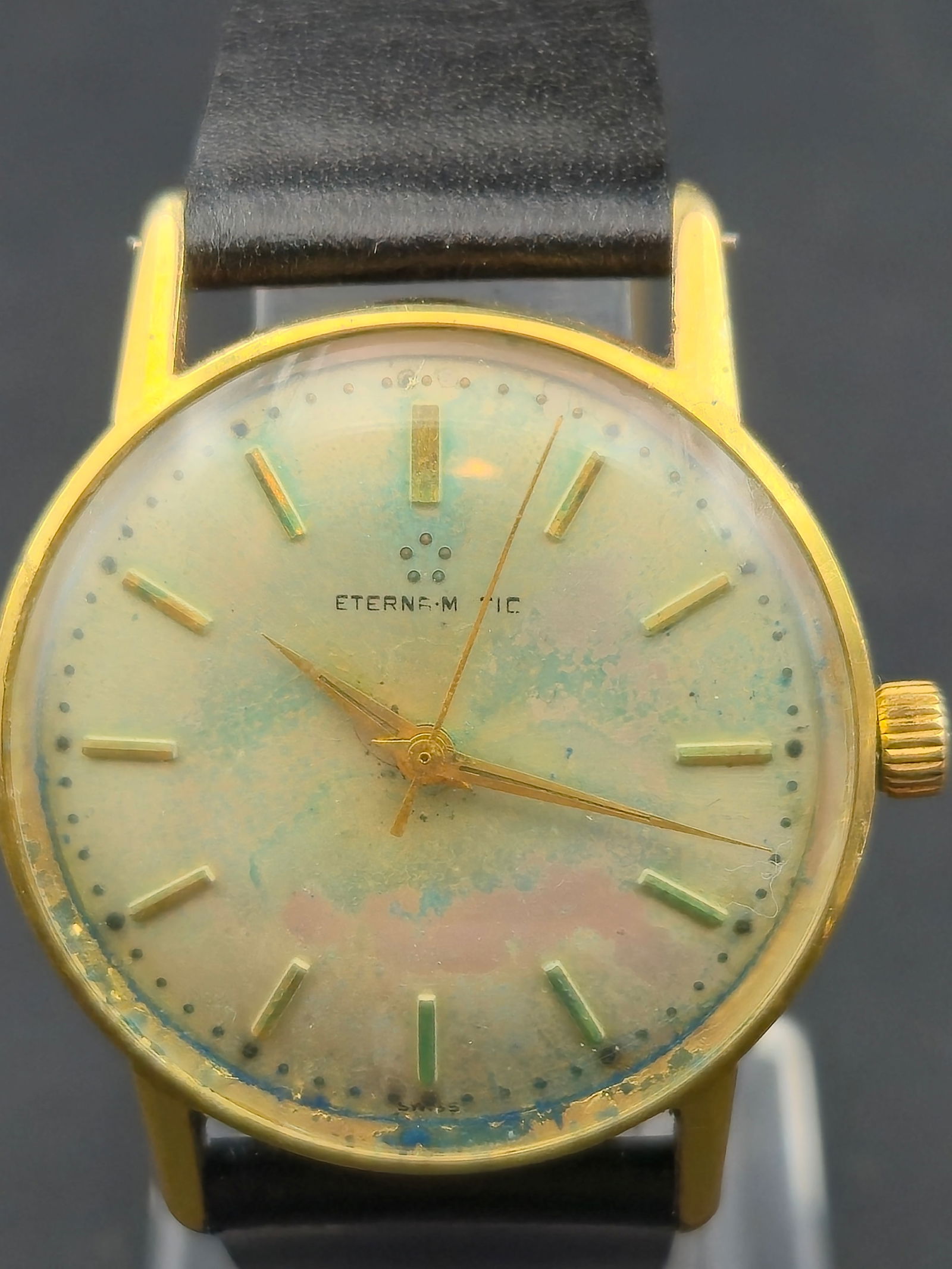 1950s Eterna Matic 32mm Automatic 17J Gold Plated Case Stainless Back Patina Dial Running: Vintage 1950s Eterna Matic automatic wristwatch featuring a heavily patinated cream dial with applied gold baton markers and central sweep seconds. Dial signed Eterna Matic with five dot logo. Swiss a