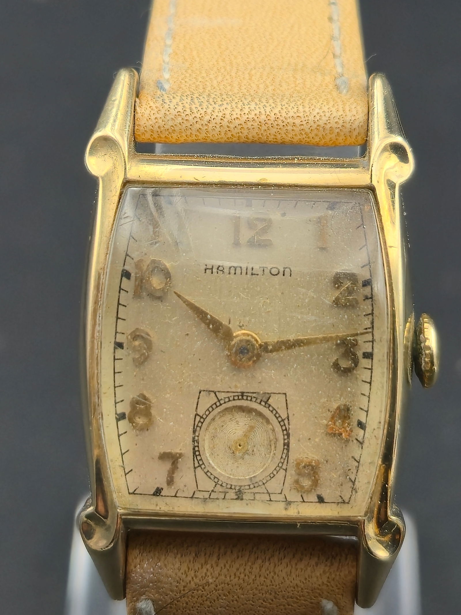 1952 Hamilton Lindsay Cal 752 17 Jewel 10K Gold Filled 23mm Curved Tank Sub Seconds Running: Vintage 1952 Hamilton Lindsay featuring a curved rectangular 10K Gold Filled case by Wadsworth and original Hamilton signed dial with applied Arabic numerals and subsidiary seconds at 6. Case interior
