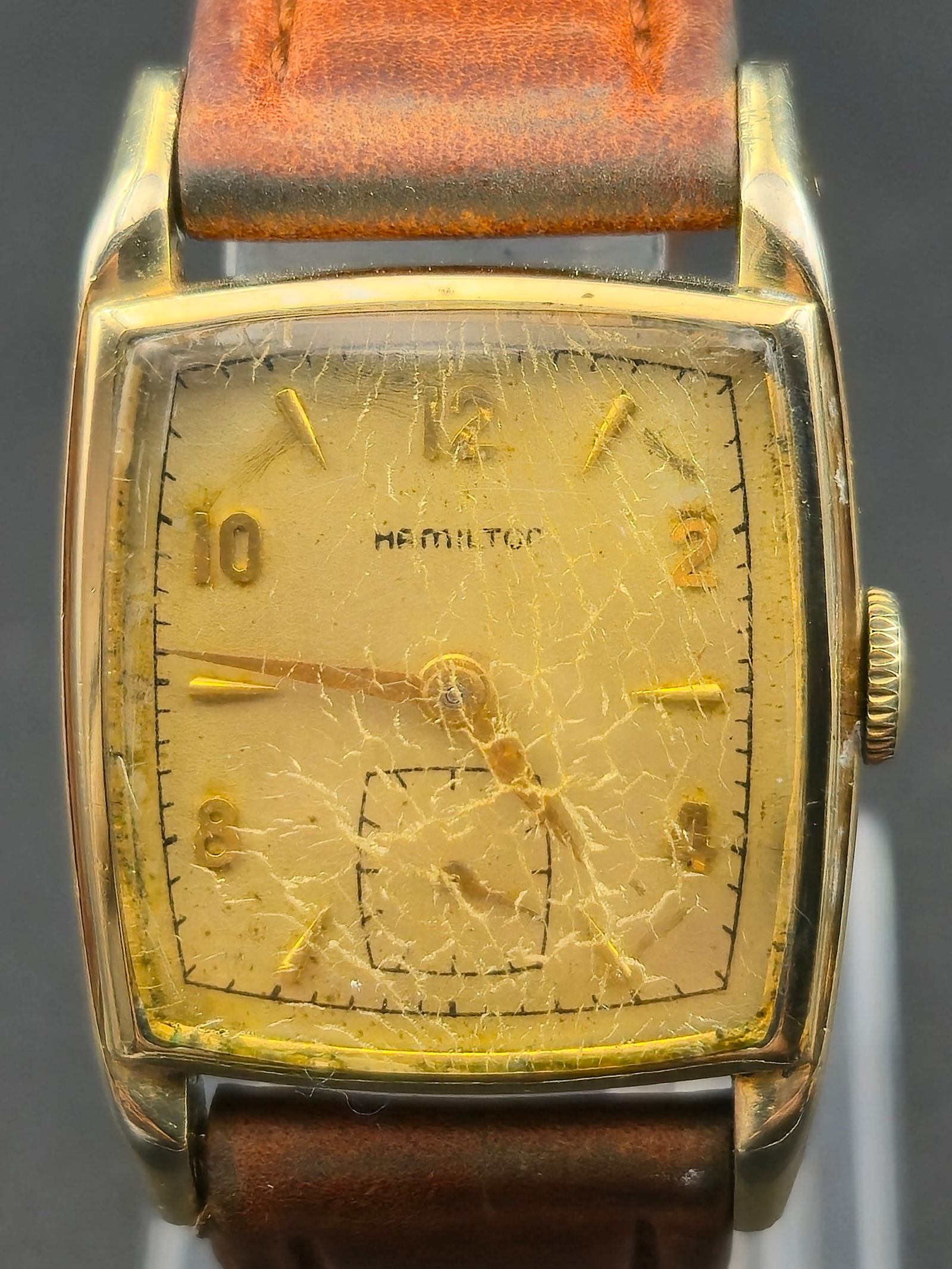 1948 Hamilton Grade 747 17J 14K Gold Filled Curved Tank 26mm Small Seconds Running Y92272: Vintage Hamilton wristwatch powered by a Hamilton Grade 747 manual wind movement marked 17 jewels and adjusted. Movement serial Y92272, estimated production year 1948 per serial range.Curved rectangul