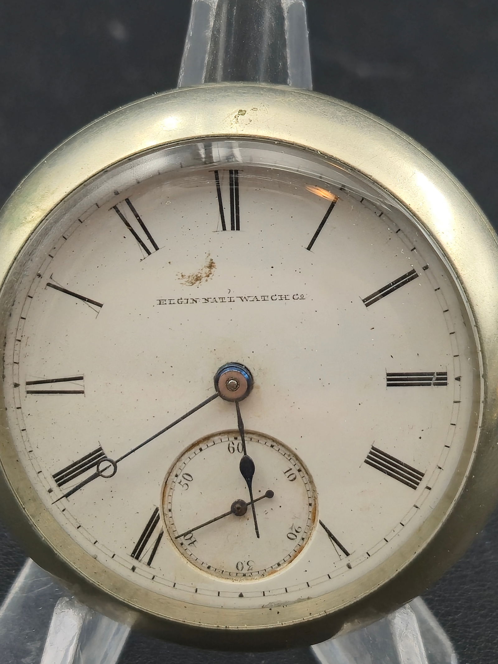 1881 Elgin Grade 6 Model 4 18s 7J Open Face Sidewinder Pocket Watch Serial 843148 Keystone Base Meta: Elgin National Watch Co pocket watch with Roman numeral enamel dial and sub-seconds at 6. Case presents as open face with no front cover shown in the photos. Crown is positioned at 3 o’clock, indica