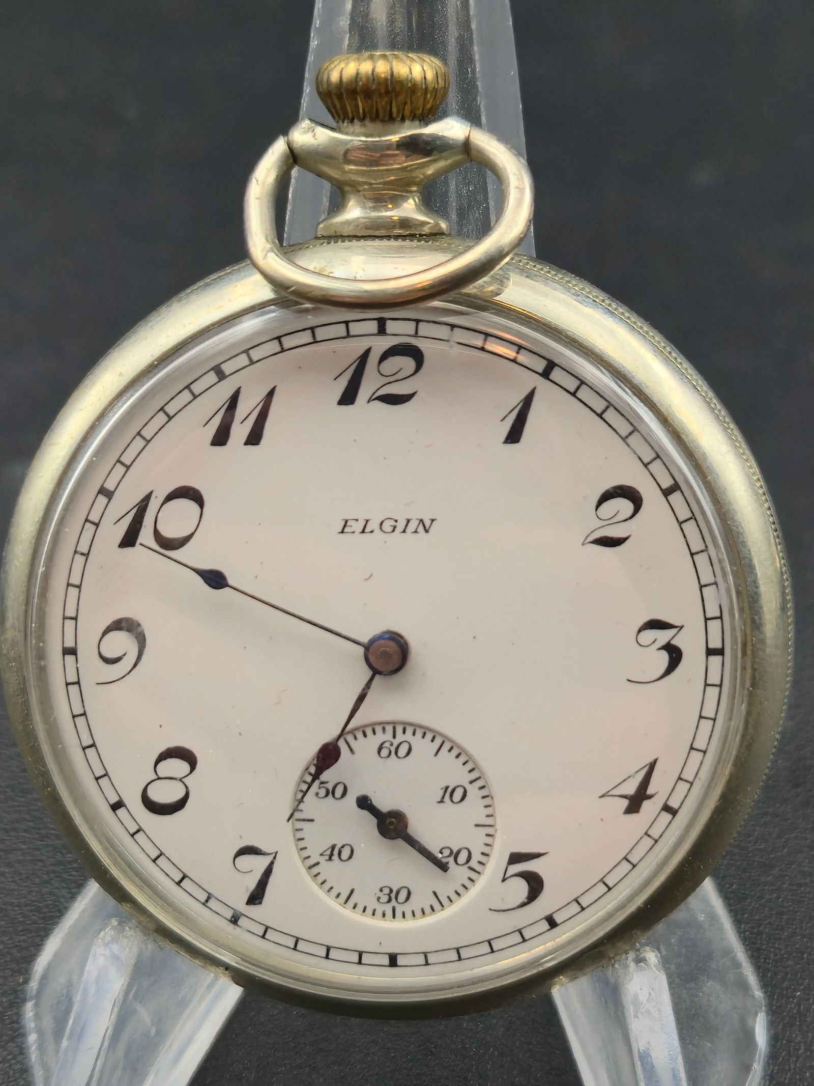 1925 Elgin Grade 291 Model 7 16s 7J Openface Pocket Watch Dueber Silverine Case Running: Elgin Natl Watch Co U.S.A. pocket watch with movement serial number 27718742. Pocket Watch Database screenshot provided shows Grade 291, Model 7, 16 size, 7 jewels, openface configuration, estimated p