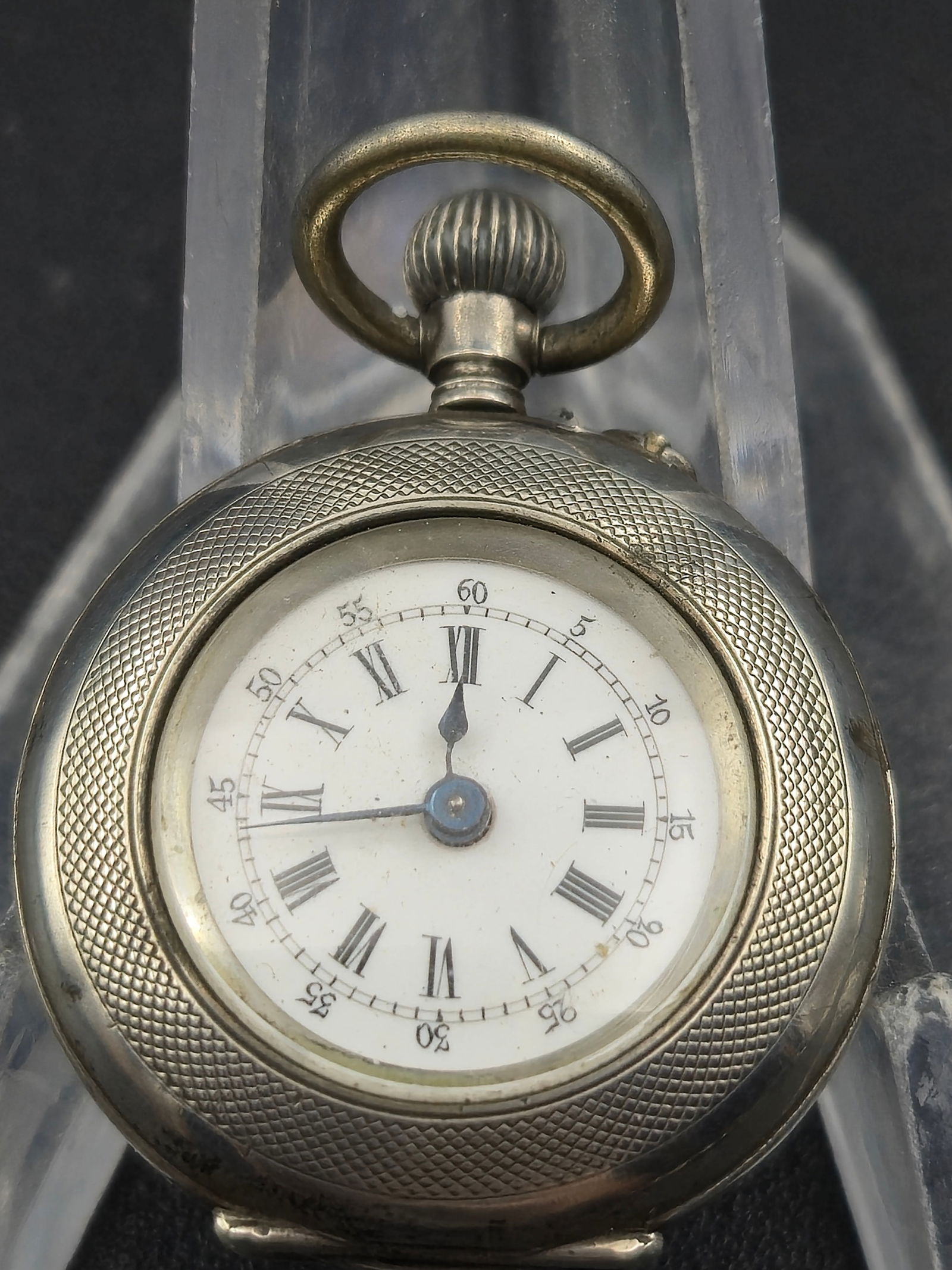 A.L. Roberts & Co Logle Swiss .800 Silver 30.53mm Ladies Pocket Watch: Early 20th century Swiss ladies pocket watch signed A.L. Roberts & Co with Logle Swiss marking inside the case.White enamel dial with Roman numerals and outer minute track. Blued hands. Dial shows lig