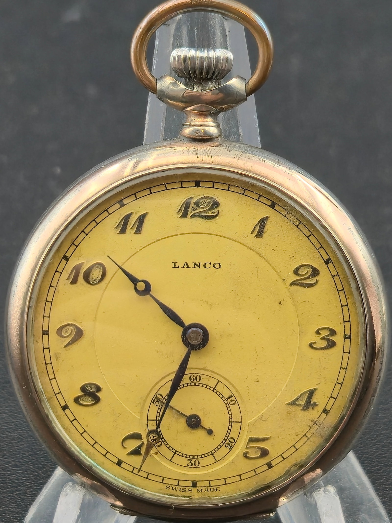 LANCO Swiss Pocket Watch 15 Rubis 0.800 Silver 50.04mm Yellow Dial Runs: Swiss pocket watch signed LANCO on the dial. Yellow dial with Arabic numerals, outer minute track, and sub-seconds at 6. Dial marked Swiss Made. Blued hands.Movement marked LANCO 15 RUBIS. Regulator m