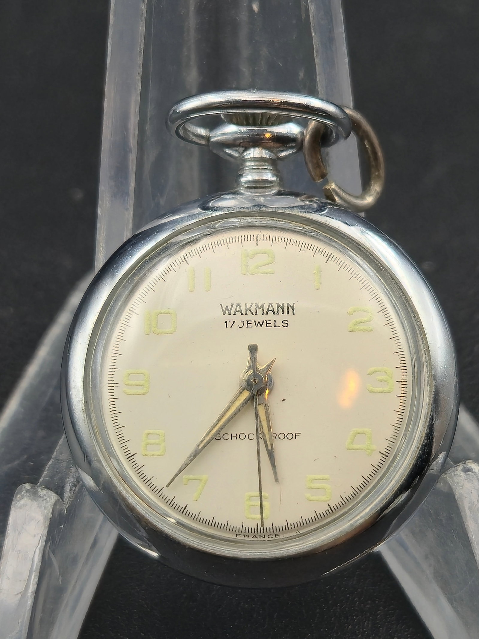 Wakmann 17J Shockproof French Pocket Watch 30mm Stainless Case Running: Wakmann Watch Co. Inc. pocket watch, Swiss movement marked Seventeen Jewels Unadjusted and Wakmann Watch Co Inc. Shockproof balance system. Movement signed France and Wakmann Watch Co Inc.White dial s