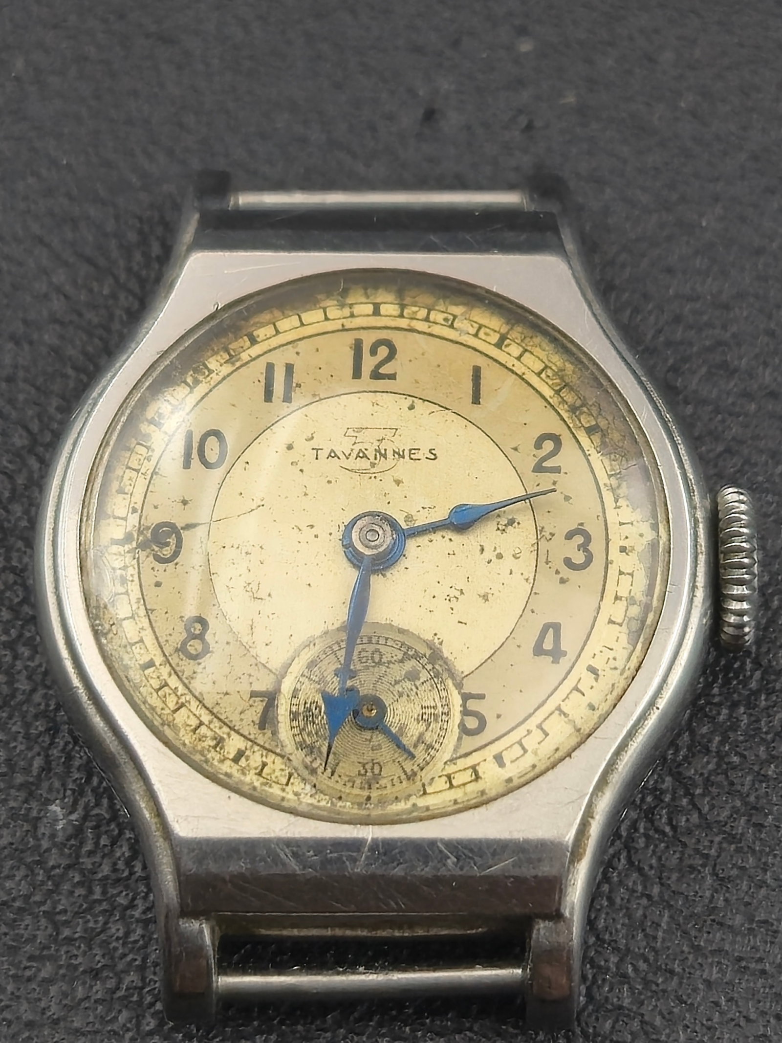 1930s Tavannes Cushion Case Small Seconds Watch 21mm Manual 15J Running: Vintage Tavannes wristwatch featuring a classic cushion shaped case with aged cream dial, Arabic numerals, and a small seconds subdial at the 6 position. The dial is signed Tavannes and shows attracti