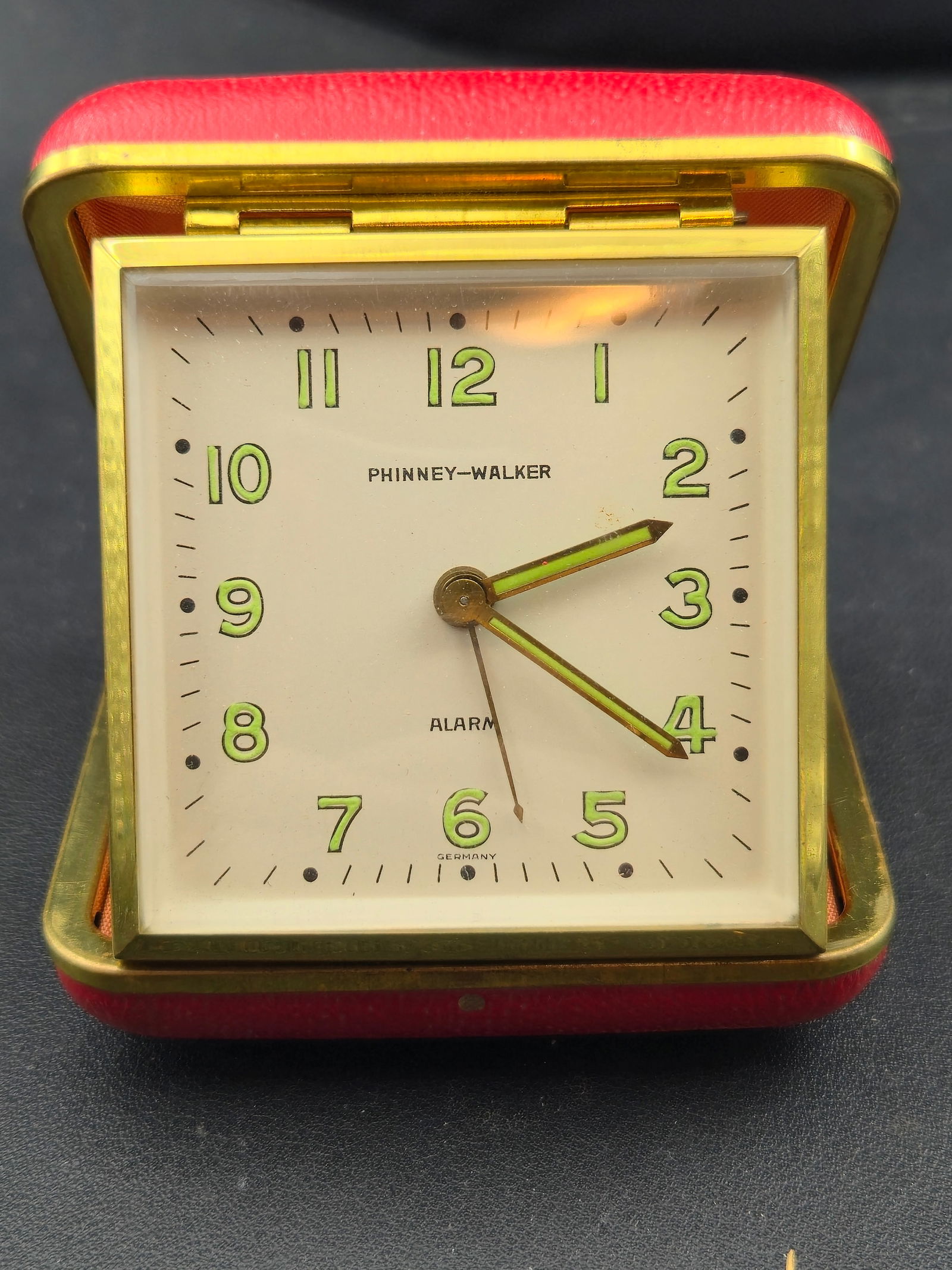 Vintage Phinney Walker Travel Alarm Clock Germany Folding Case Untested: Vintage Phinney Walker travel alarm clock in a folding case. The clock features a square dial with luminous Arabic numerals and luminous hands. The dial is signed Phinney Walker and marked Alarm with