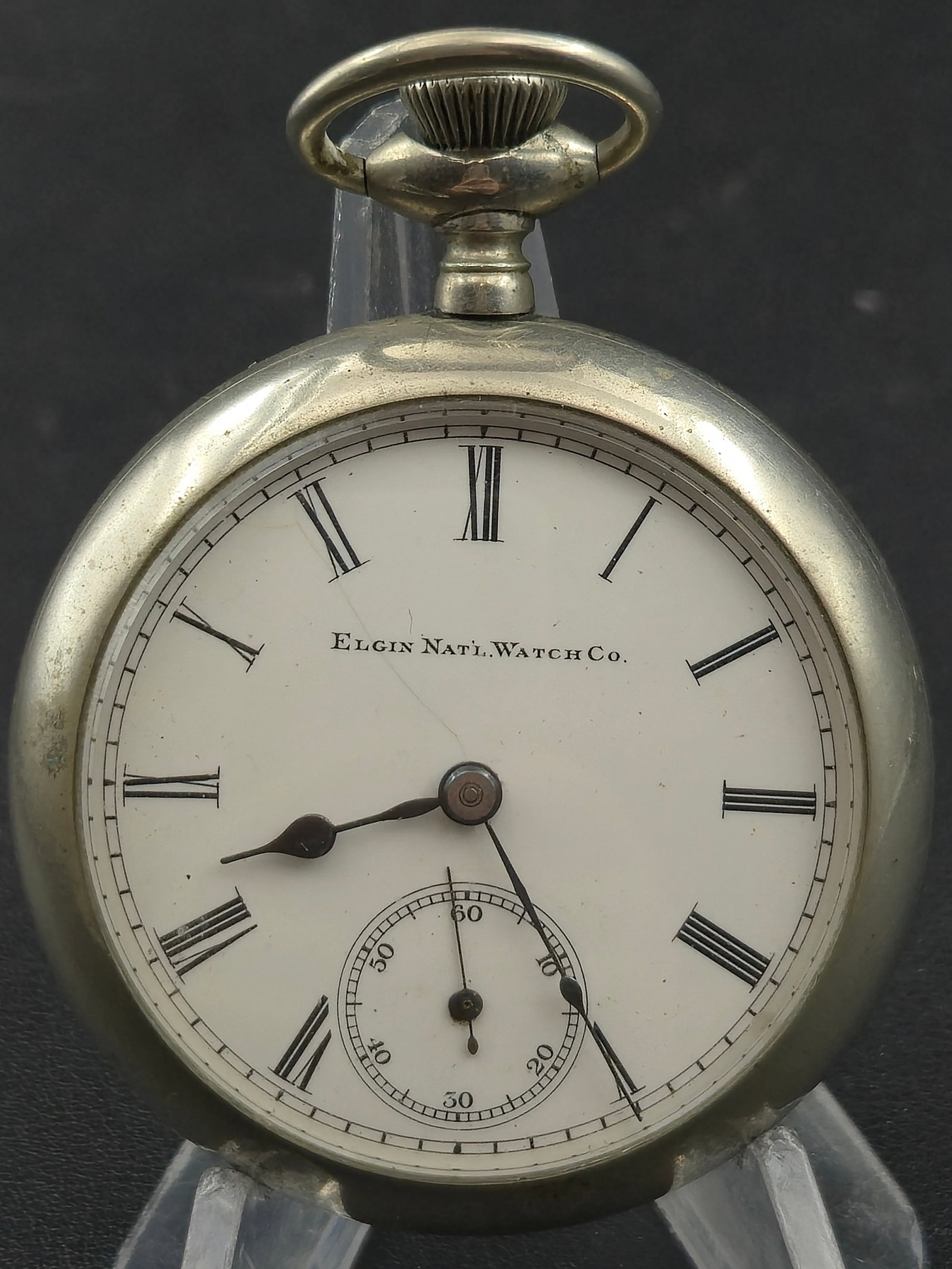 1929 Elgin Grade 288 Model 5 18s 7J Pocket Watch Serial 31602745 Keystone Silveroid Case Running: American pocket watch produced by the Elgin National Watch Company around 1929. The movement serial number 31602745 corresponds to Elgin Grade 288 Model 5 according to the pocket watch database. This