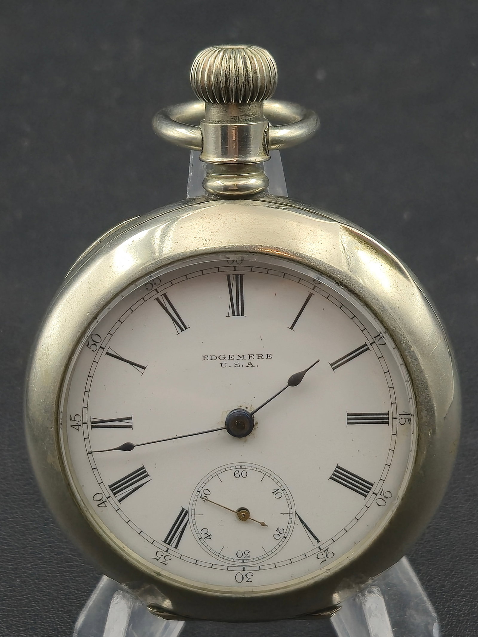 Edgemere U.S.A. 18s Pocket Watch Dueber Silverine Hunter Case Stag Engraved Running: Pocket watch signed Edgemere U.S.A. on both the dial and movement.The watch is an 18 size mechanical pocket watch housed in a Dueber Silverine hunter case featuring an engraved stag/deer scene on the