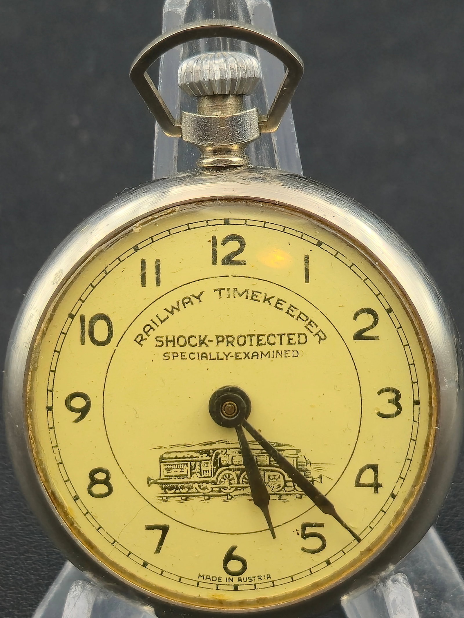 Ward Watch Co Railway Timekeeper Shock Protected Austrian Pocket Watch 48mm Running: Vintage pocket watch signed Railway Timekeeper – Shock Protected – Specially Examined with a locomotive illustration on the dial. The dial is marked Made in Austria, and the movement is stamped Wa