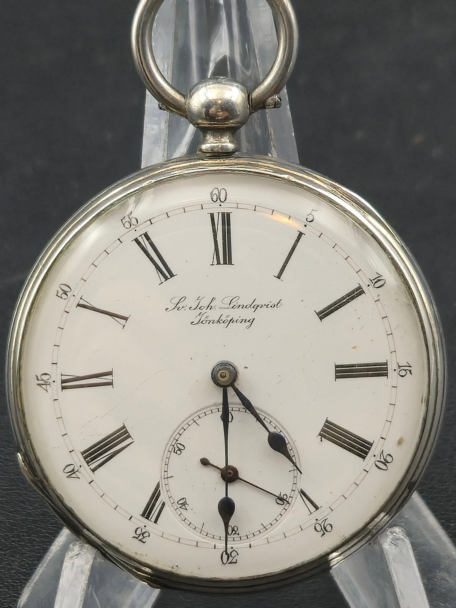 c.1890 Private Label Lindqvist Jönköping Pocket Watch 46mm 0.800 Silver Runs: Antique Swiss pocket watch with a private label dial signed S. Joh. Lindqvist, Jönköping, indicating it was retailed by a Swedish jeweler rather than manufactured by them. The movement is a typical