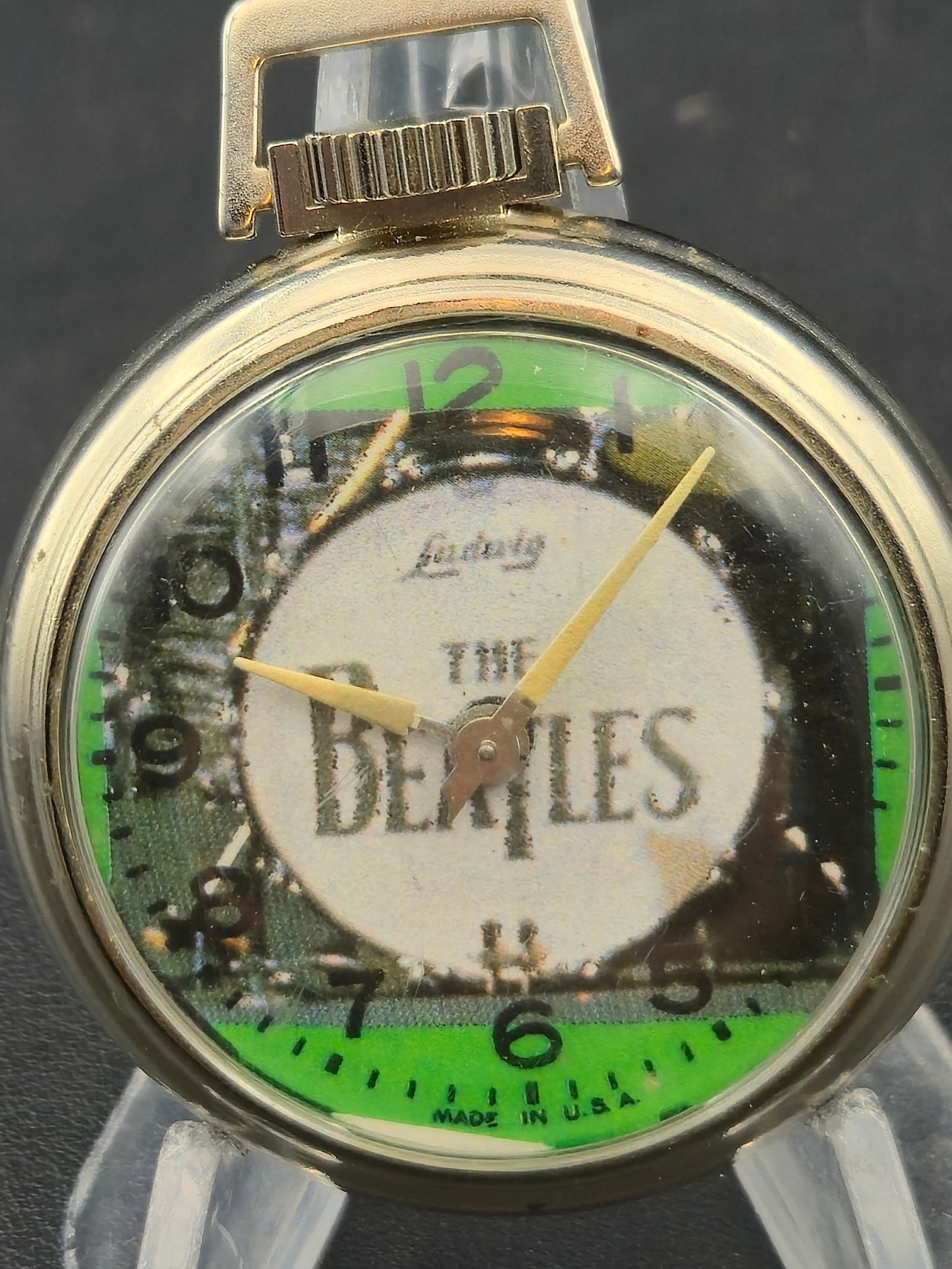 Vintage c1970s The Beatles Lucerne Pocket Watch Made in USA 49mm Running: Vintage novelty pocket watch featuring The Beatles graphic dial, signed Lucerne, with “Made in U.S.A.” printed at the bottom. The watch has a mechanical movement, confirmed by the internal mec