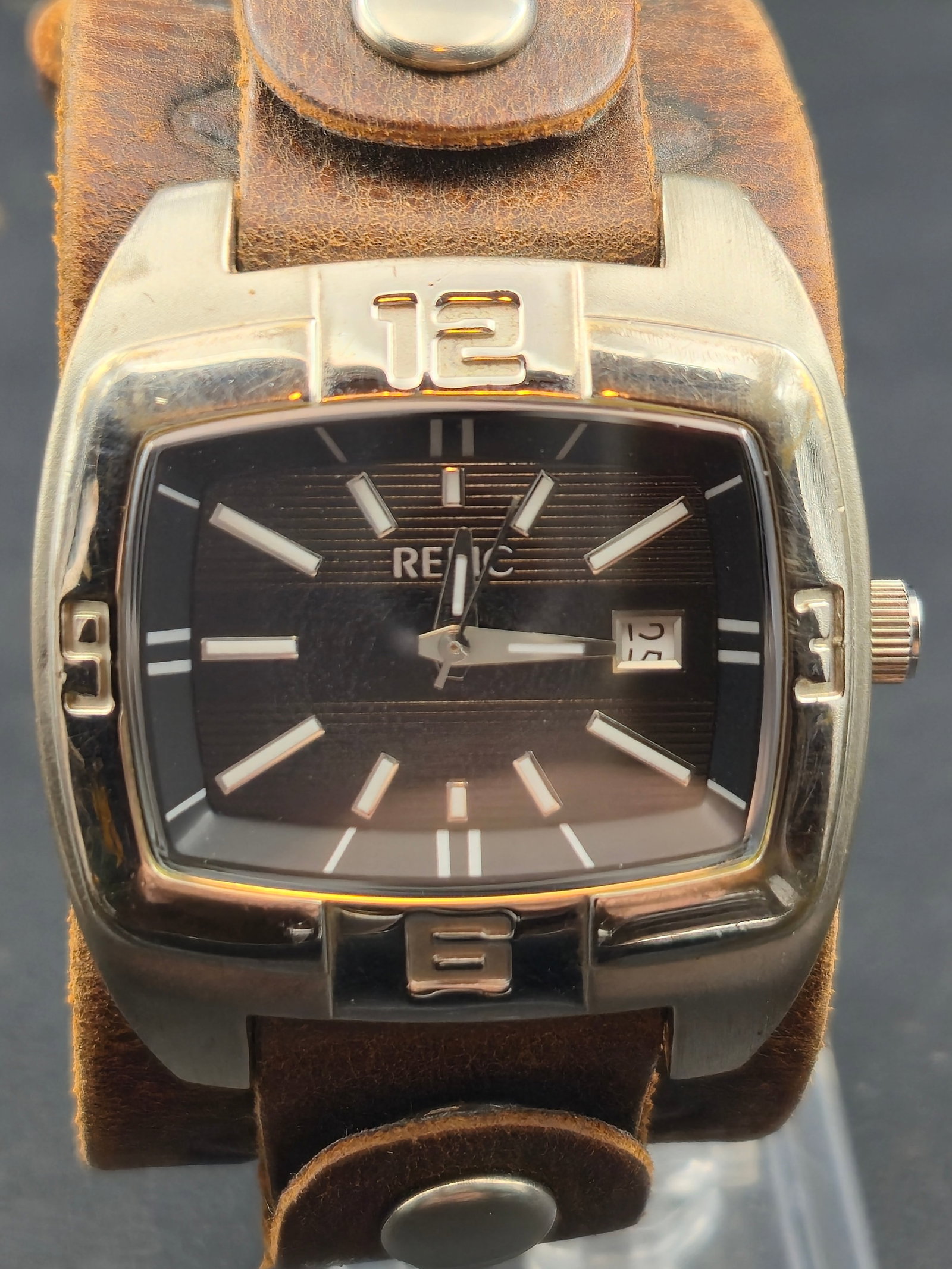 Fossil Relic Cushion Case Date Watch Brown Leather Strap Quartz Running w Box: Fossil Relic cushion case wristwatch featuring a black dial with applied indices and date window at 3 o’clock. Distinctive oversized case design with integrated numeral accents at 12, 3, 6, and 9. F