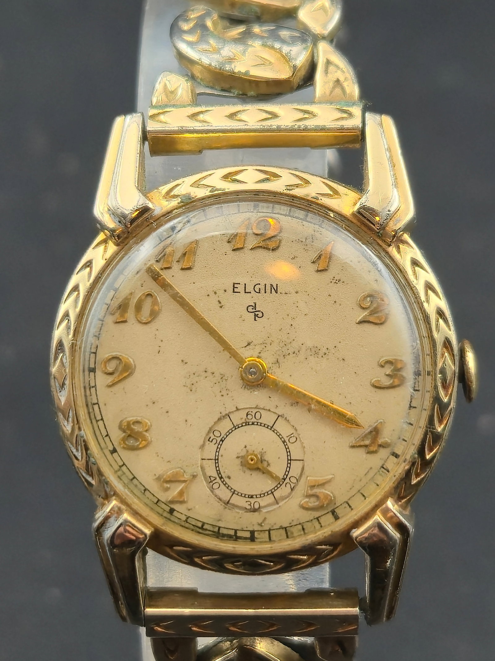Elgin 554 17J 1940s GF Fancy Lug Small Seconds Vintage Dress Watch Running: Vintage Elgin dress watch from the 1940s featuring a U.S.A. made caliber 554 manual wind movement with 17 jewels and 4 adjustments. Original silver dial with applied gold Arabic numerals and small sec