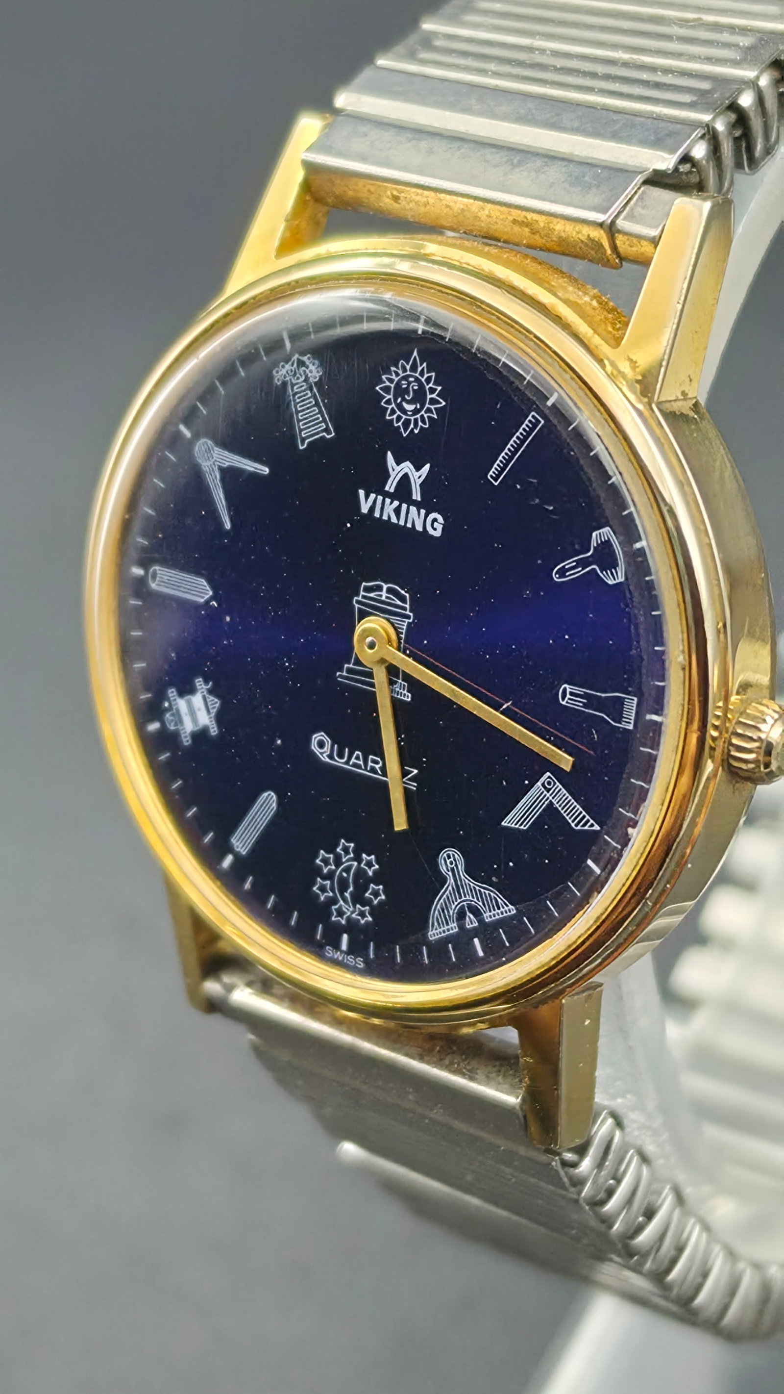 Vintage Viking Swiss Quartz Men's Watch Masonic Freemason Blue Dial Gold-Tone Two-Tone New Battery: Up for auction is a vintage Viking Swiss Quartz men's wristwatch featuring one of the most unique and eye-catching dials you will find. The deep blue starfield dial replaces traditional hour markers w