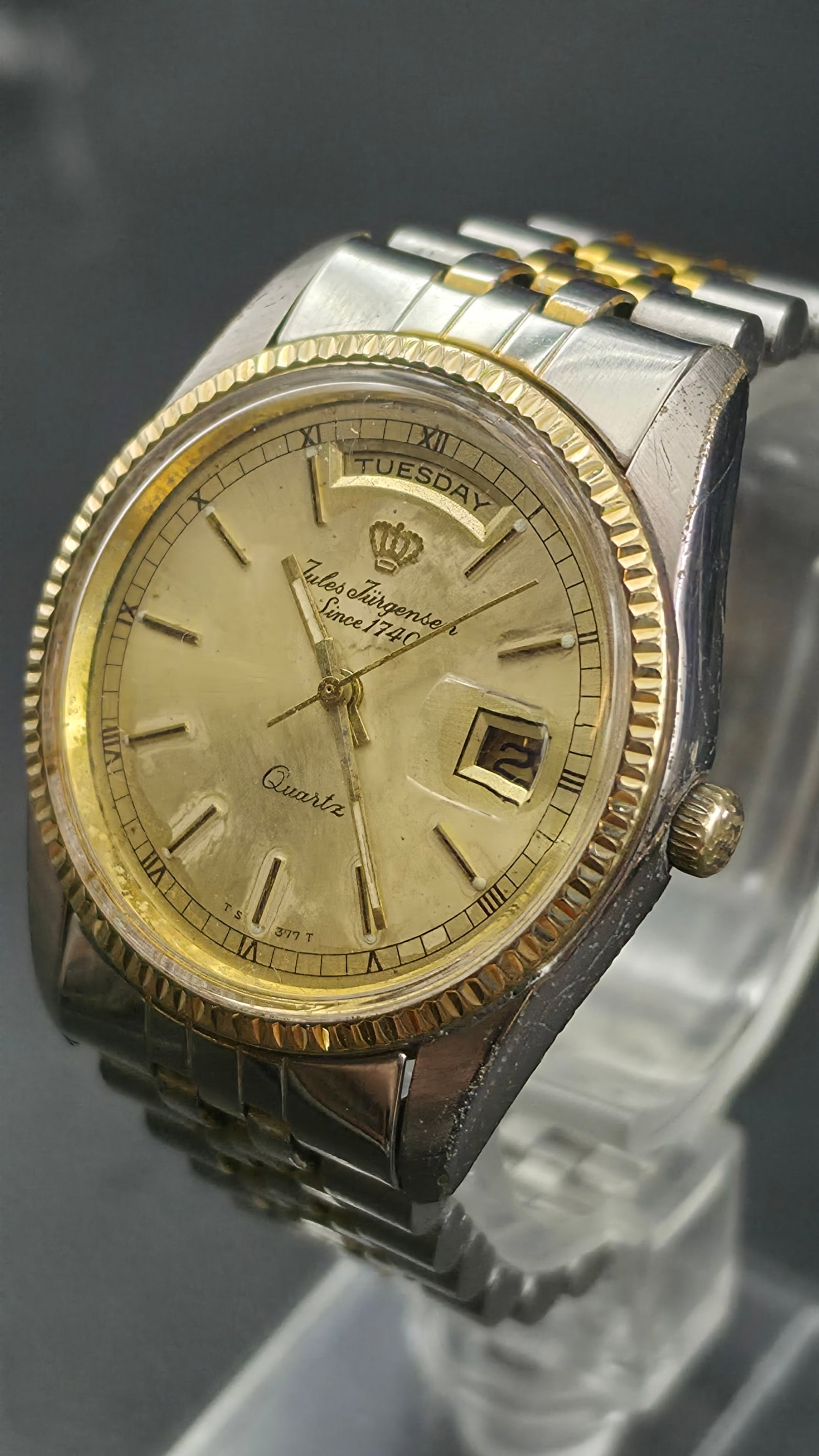 Jules Jurgensen Since 1740 Day Date Quartz Two Tone 35mm Model 5896: This is a vintage Jules Jurgensen Since 1740 day-date quartz watch, model 5896, with a two tone case measuring 35mm as shown by calipers in the photos. The bezel is gold tone with a coin edge surround