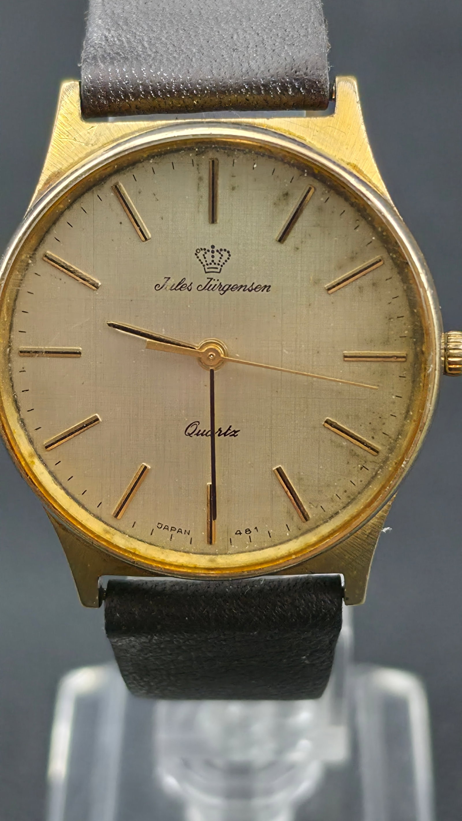 Jules Jurgensen Quartz Dress Watch Model 5956 Gold Tone 32mm Japan Movement: This is a vintage Jules Jurgensen quartz dress watch, model 5956, with a gold tone base metal case measuring 32mm as shown by calipers in the photos. The slim profile case has angular lugs with a brus