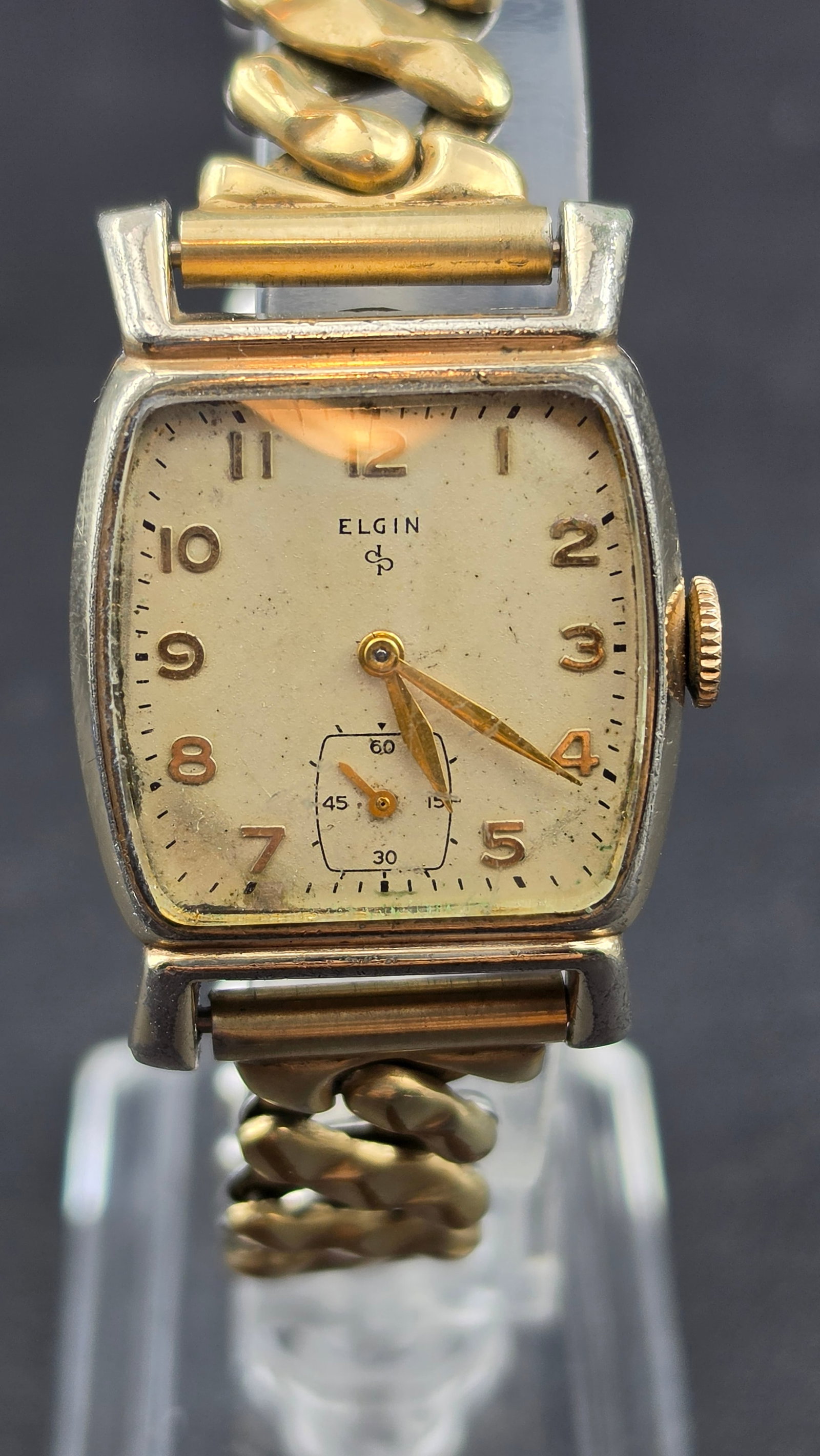 Elgin Grade 554 15J 4 Adj USA Cushion Case Wristwatch with Admiral 10K GF Bracelet c.1941-1947 Runs: This is a vintage American Elgin wristwatch powered by the Grade 554 movement, a 15-jewel, 4-adjustment manual-wind caliber made in the USA, serial number H213746, placing production in the early-to-m