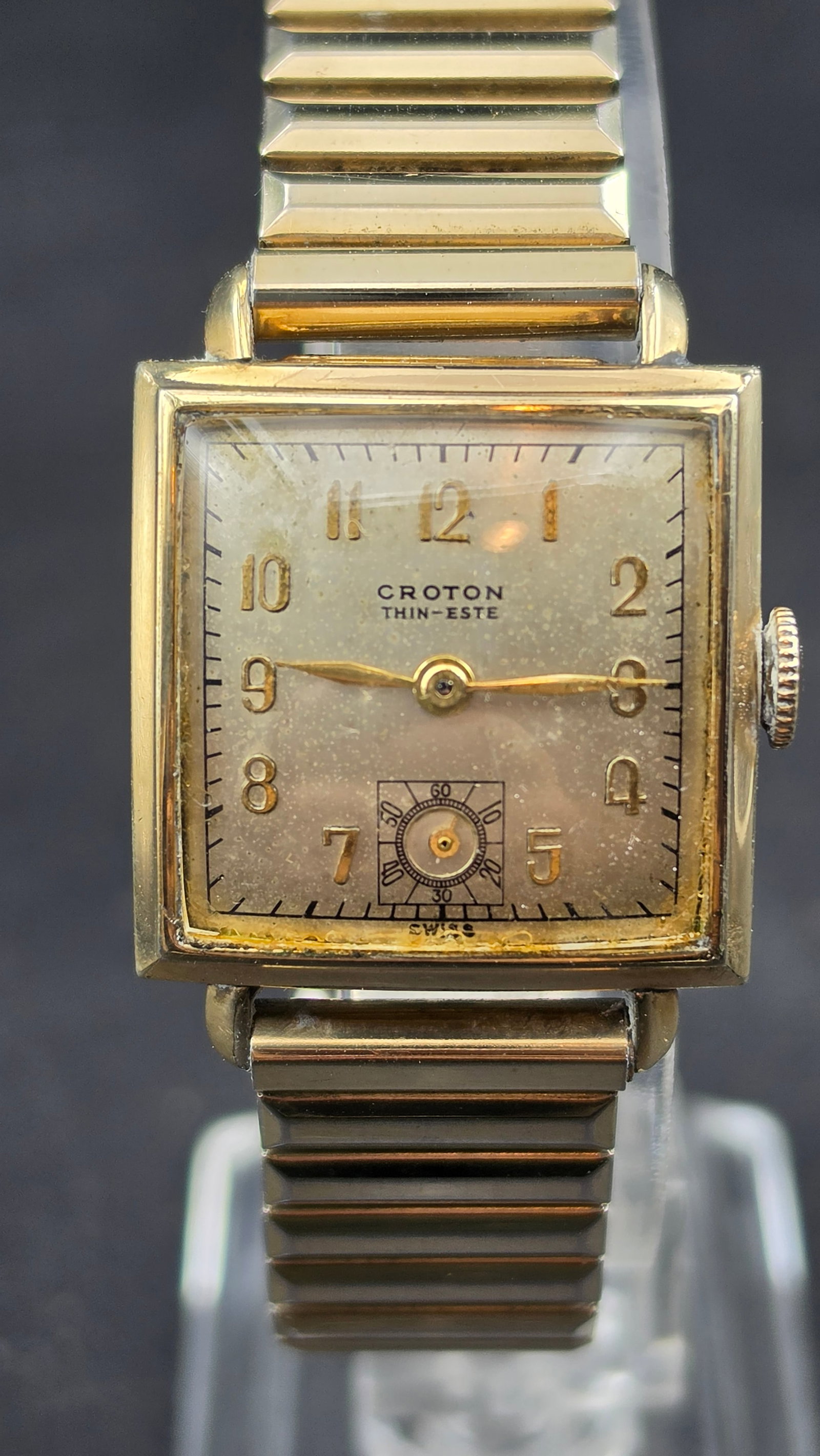 1950s Croton Thin-Este 10K RGP Square Tank 25mm 17J Swiss Movement: This is a Croton Thin-Este dress watch from the mid-1950s, measuring 25.59mm across the case as confirmed by calipers. The square tank-style case is marked 10K R.G.P. on the lug, indicating a 10 karat